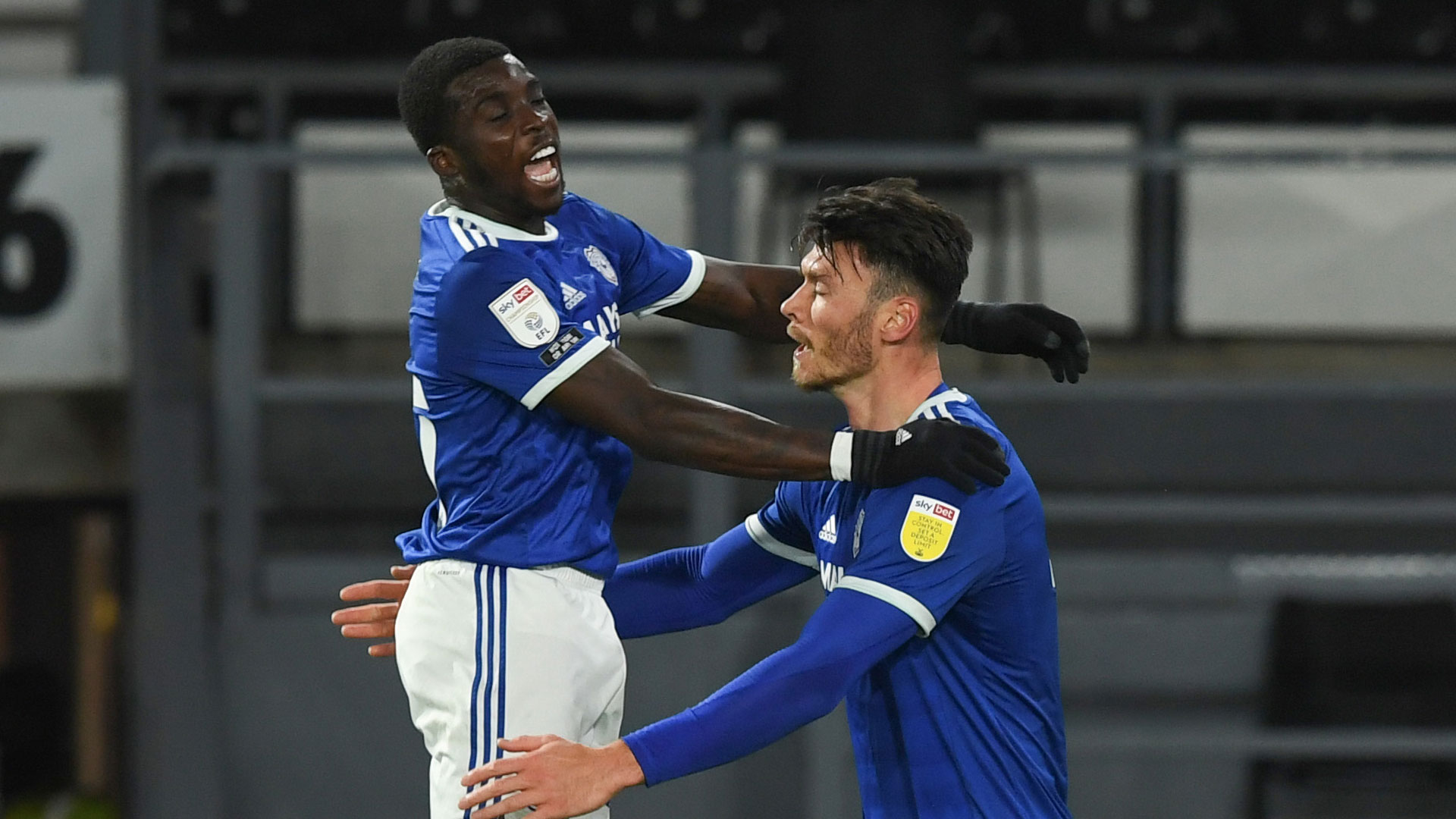 Sheyi Ojo celebrates with Kieffer Moore...