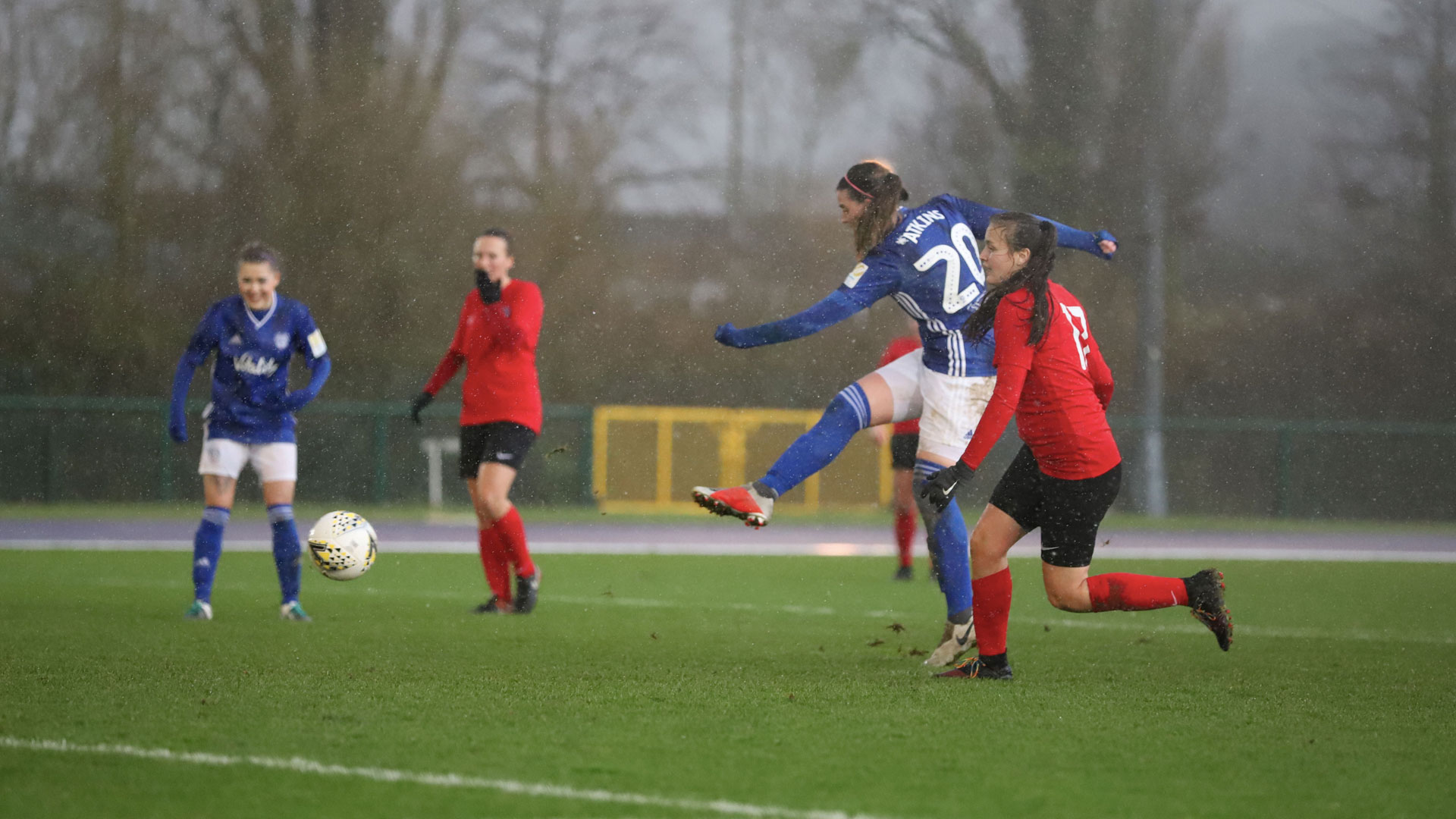 Zoe Atkins shoots against Cyncoed...