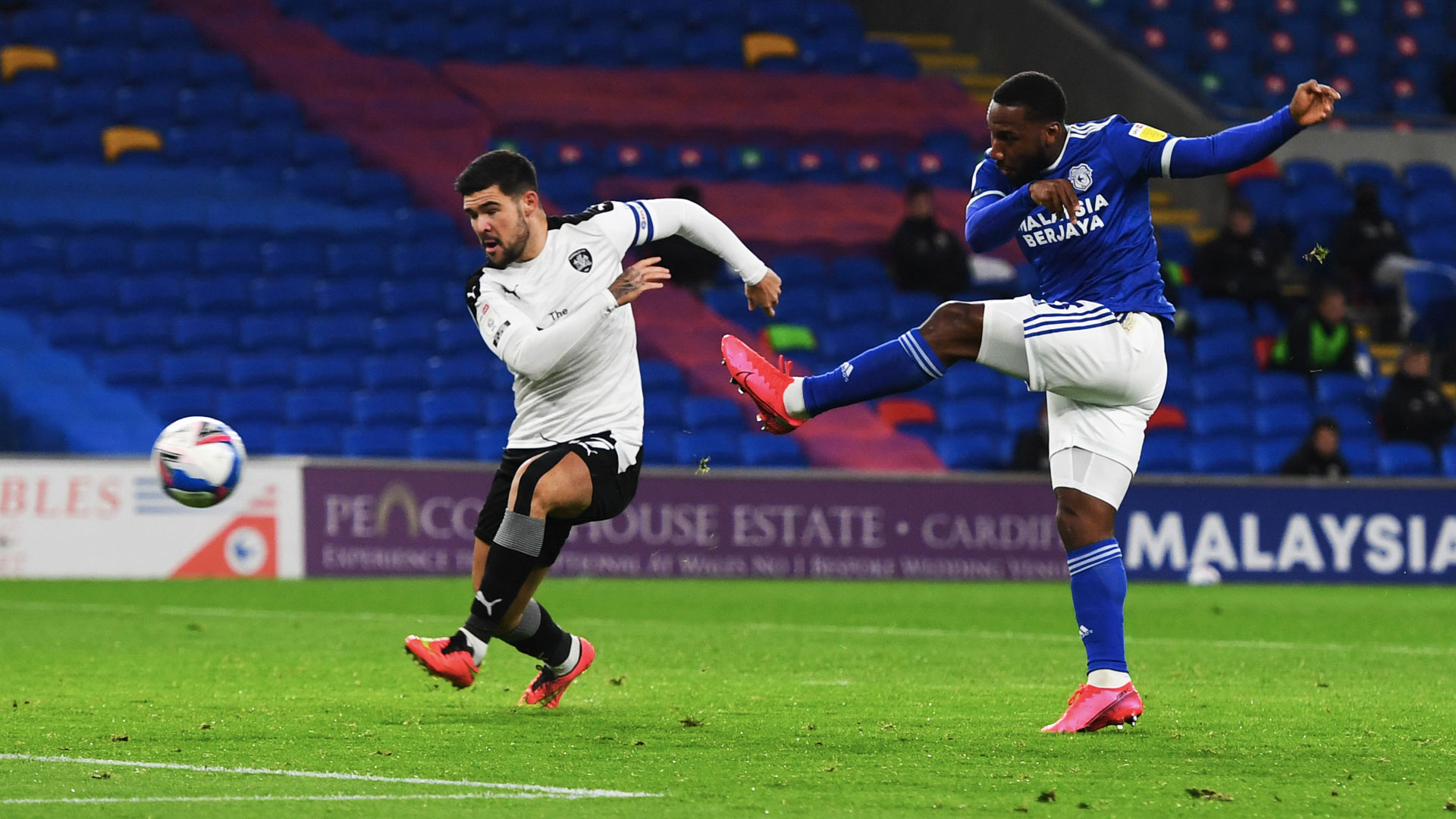 Junior Hoilett nets the opener against Barnsley...