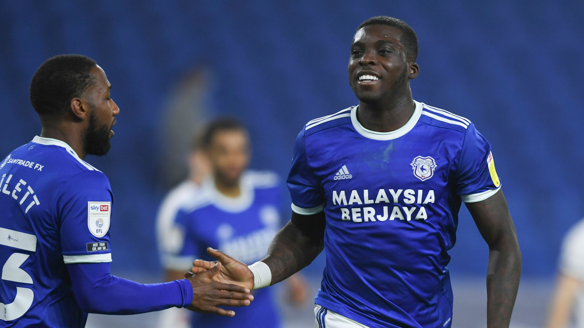 Sheyi Ojo celebrates after netting against Luton...