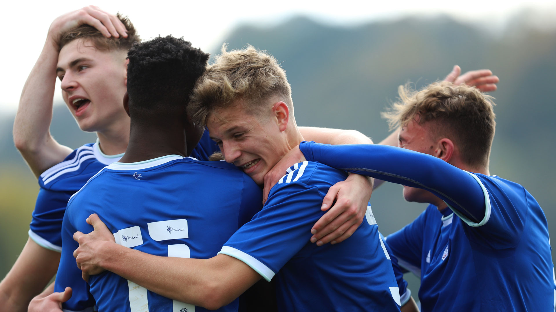 City's U18 squad celebrate...