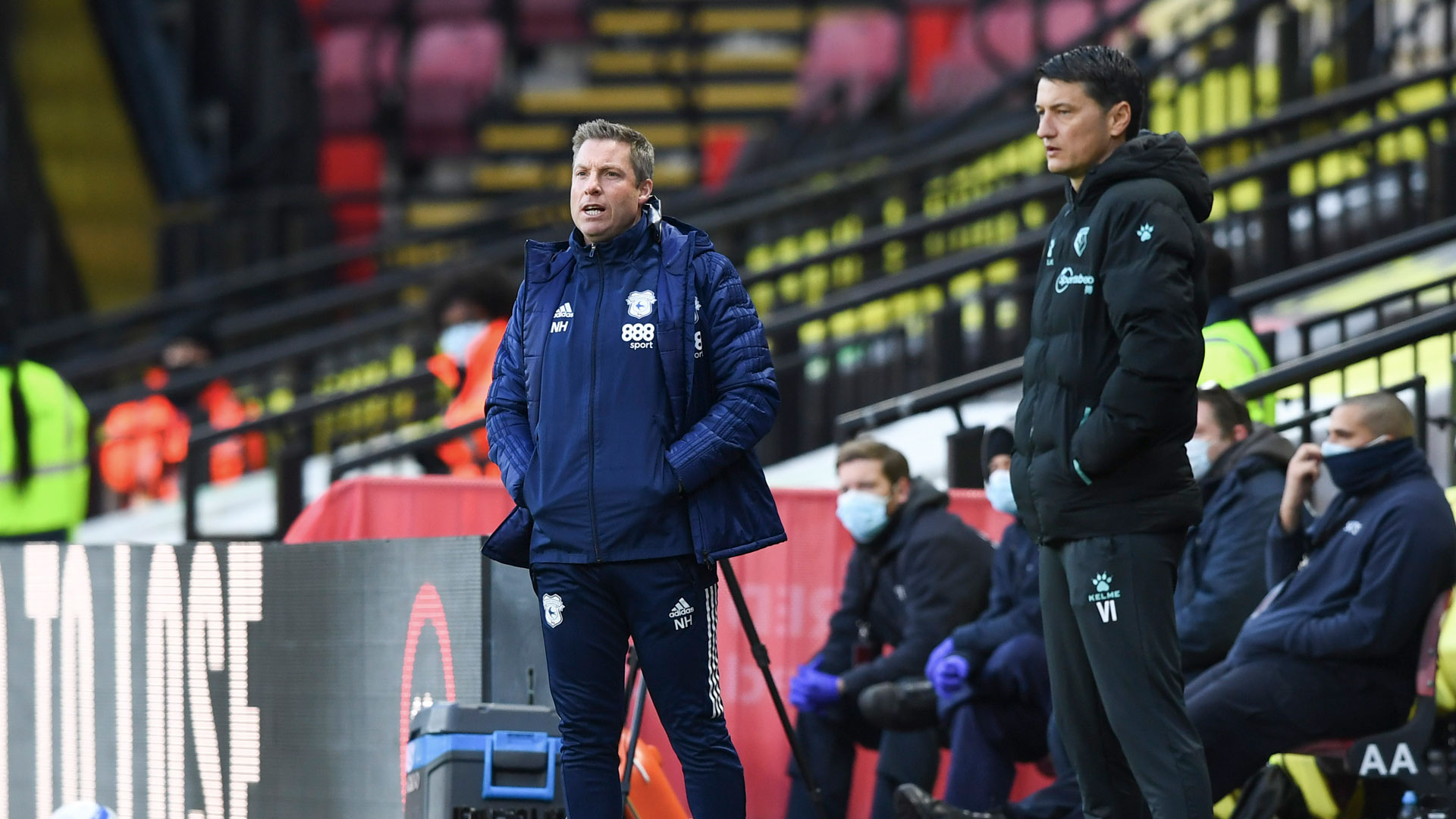 Neil Harris watches on as City face Watford...