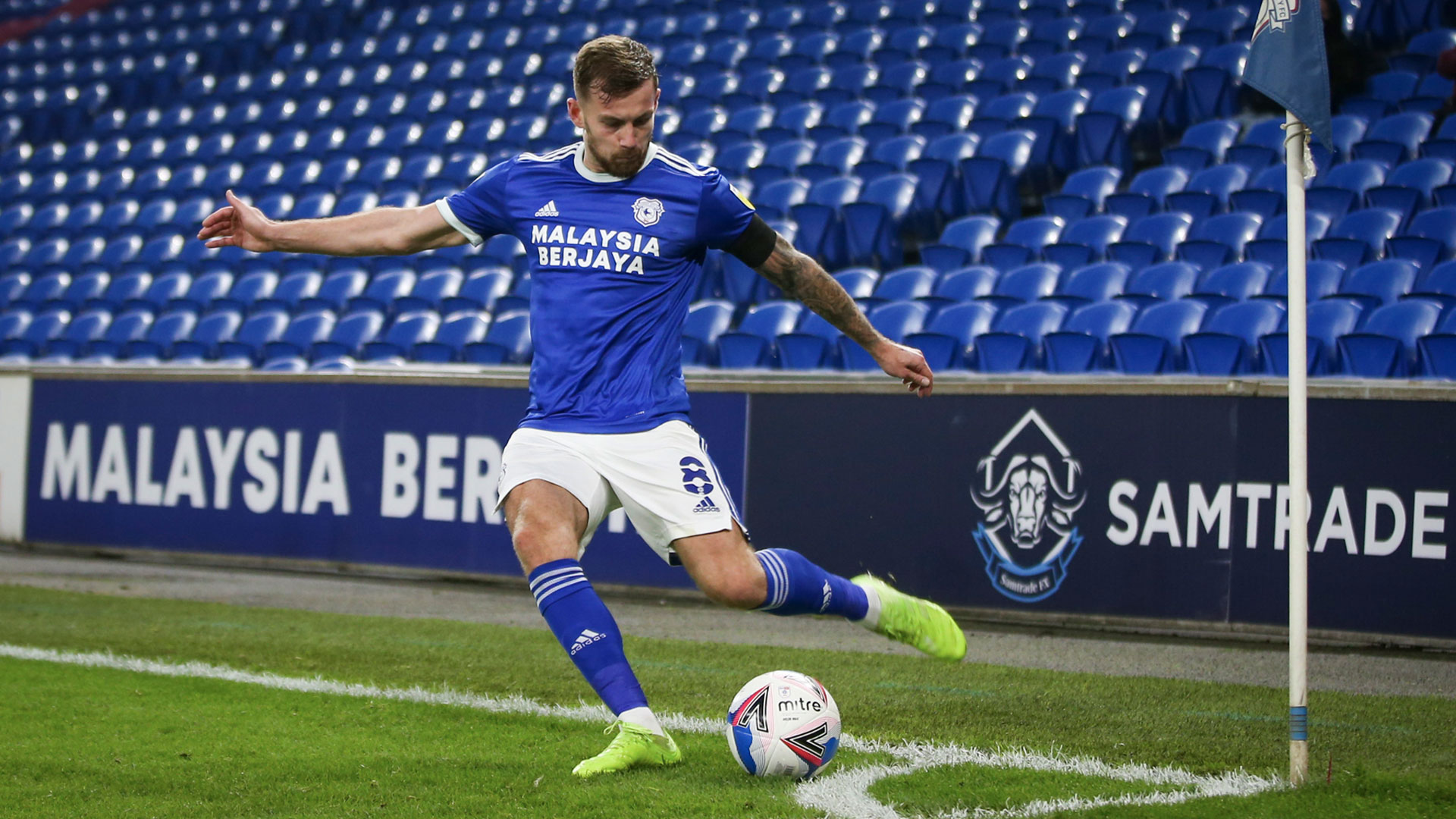 Joe Ralls takes a corner against Luton Town...