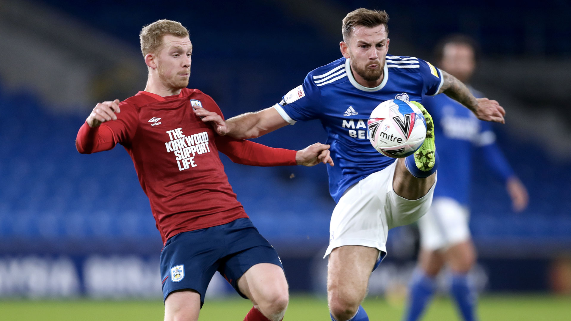 Joe Ralls battles against Huddersfield...