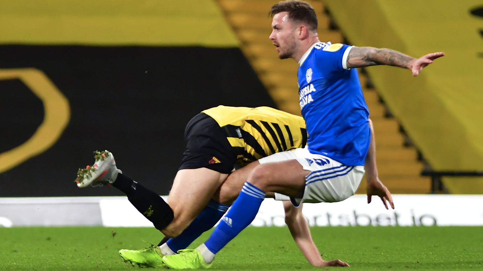 Joe Ralls battles against Watford...