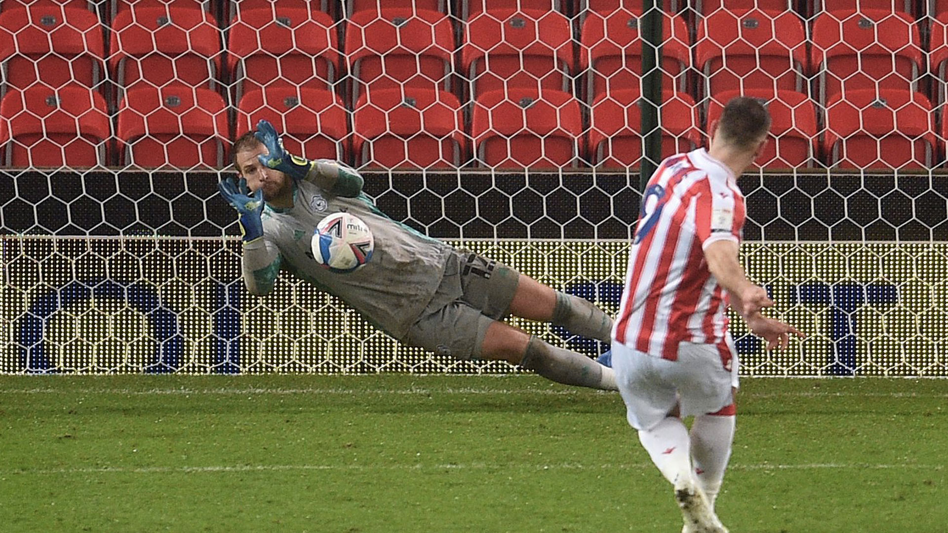 Alex Smithies saves Sam Vokes' penalty...