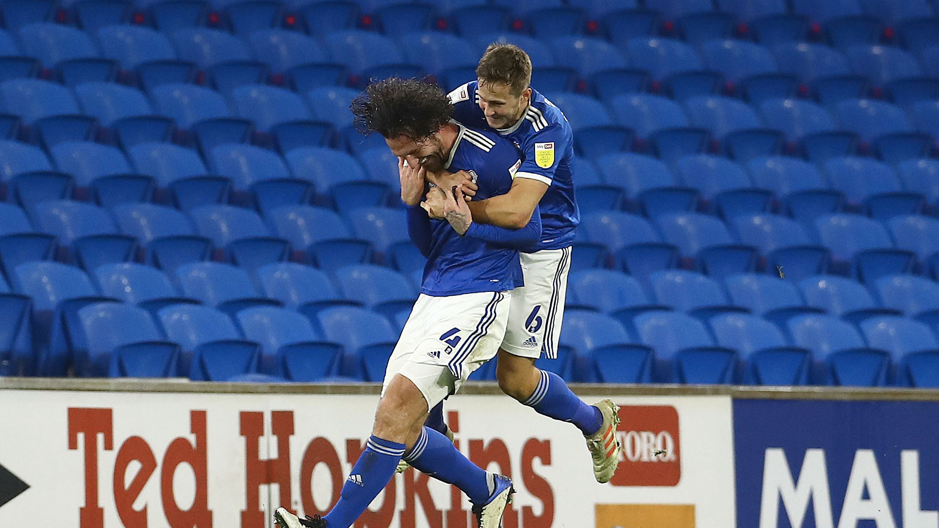 Sean Morrison celebrates his late winner with Will Vaulks...