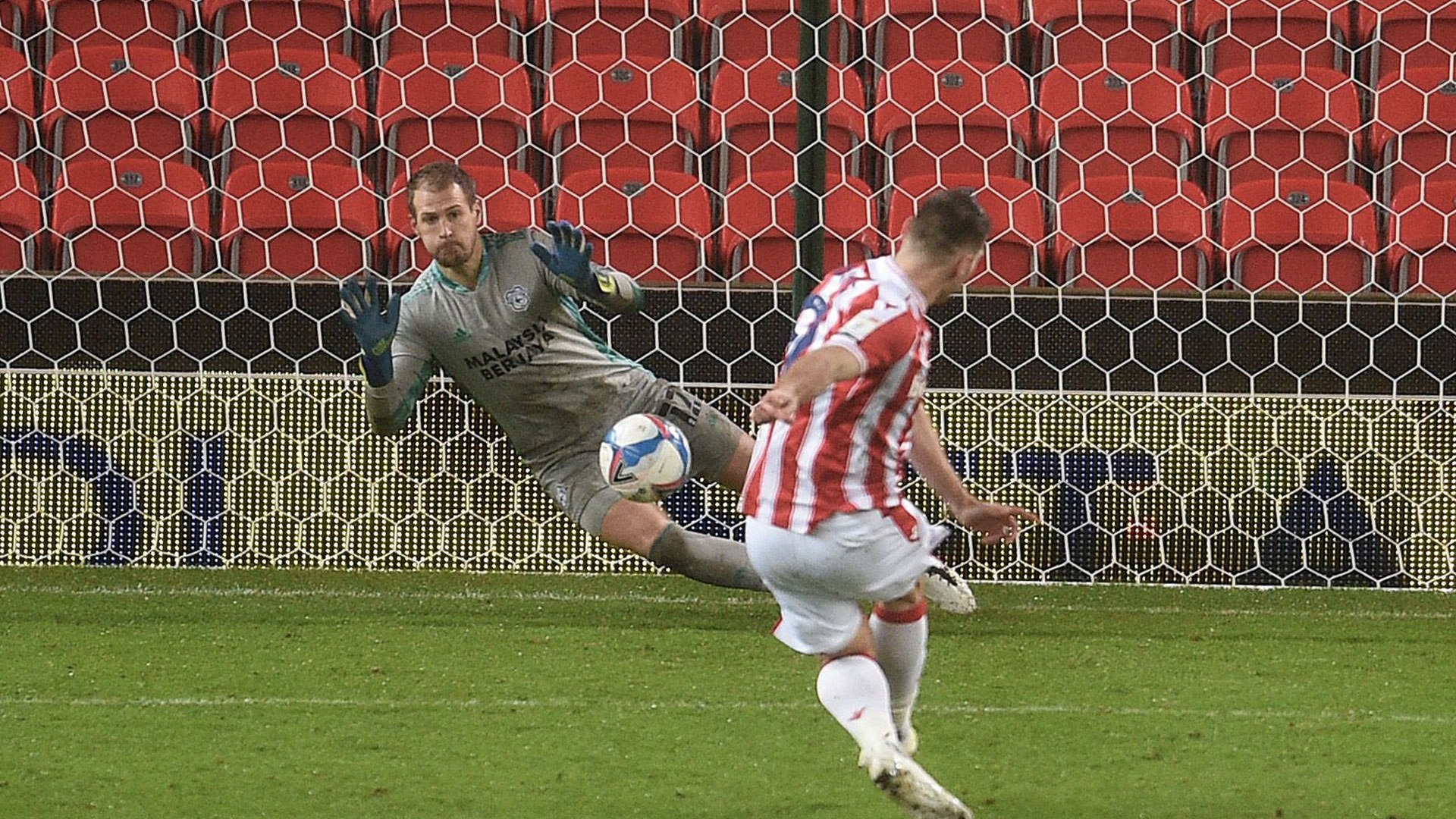 Alex Smithies saves Sam Vokes' penalty...