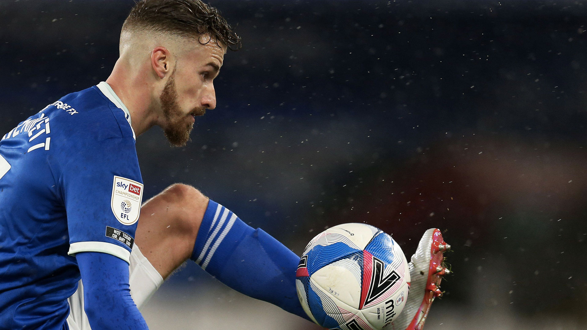 Joe Bennett controls the ball, looking to set City on the attack...