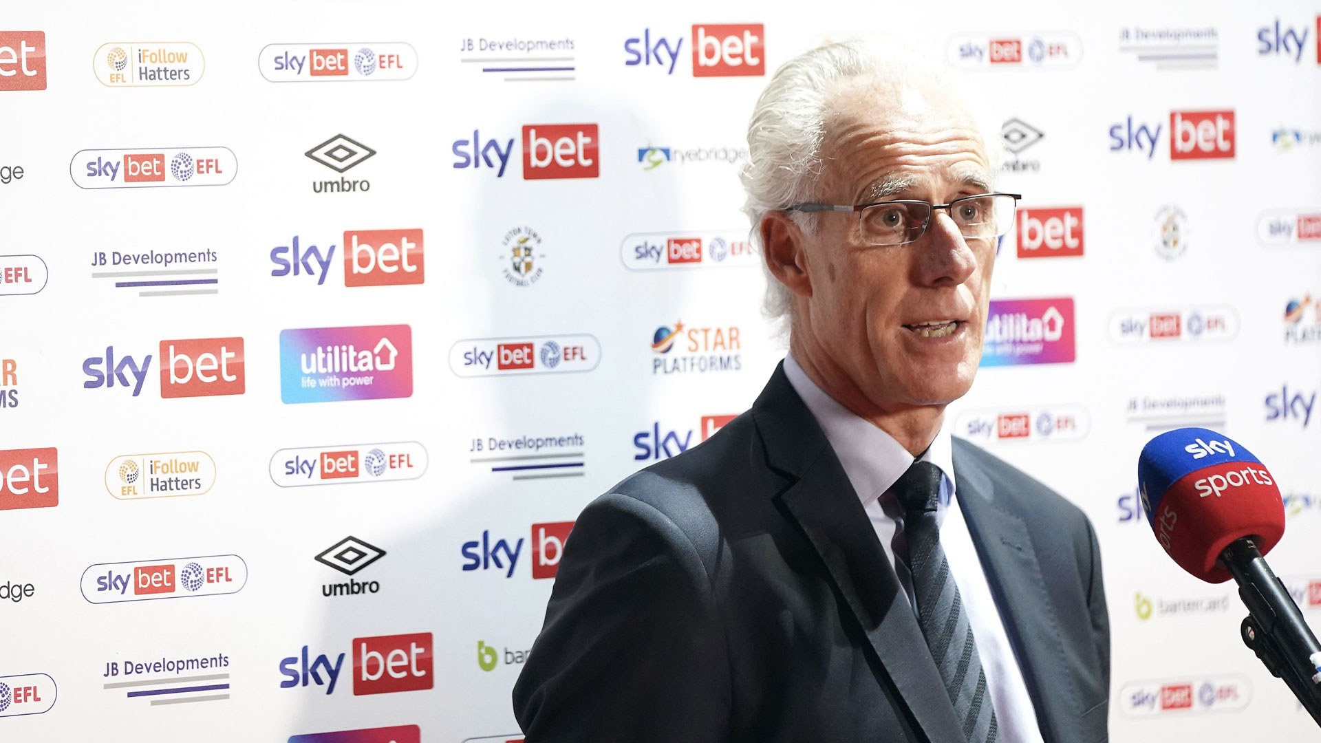 Mick McCarthy addresses the press at Kenilworth Road...