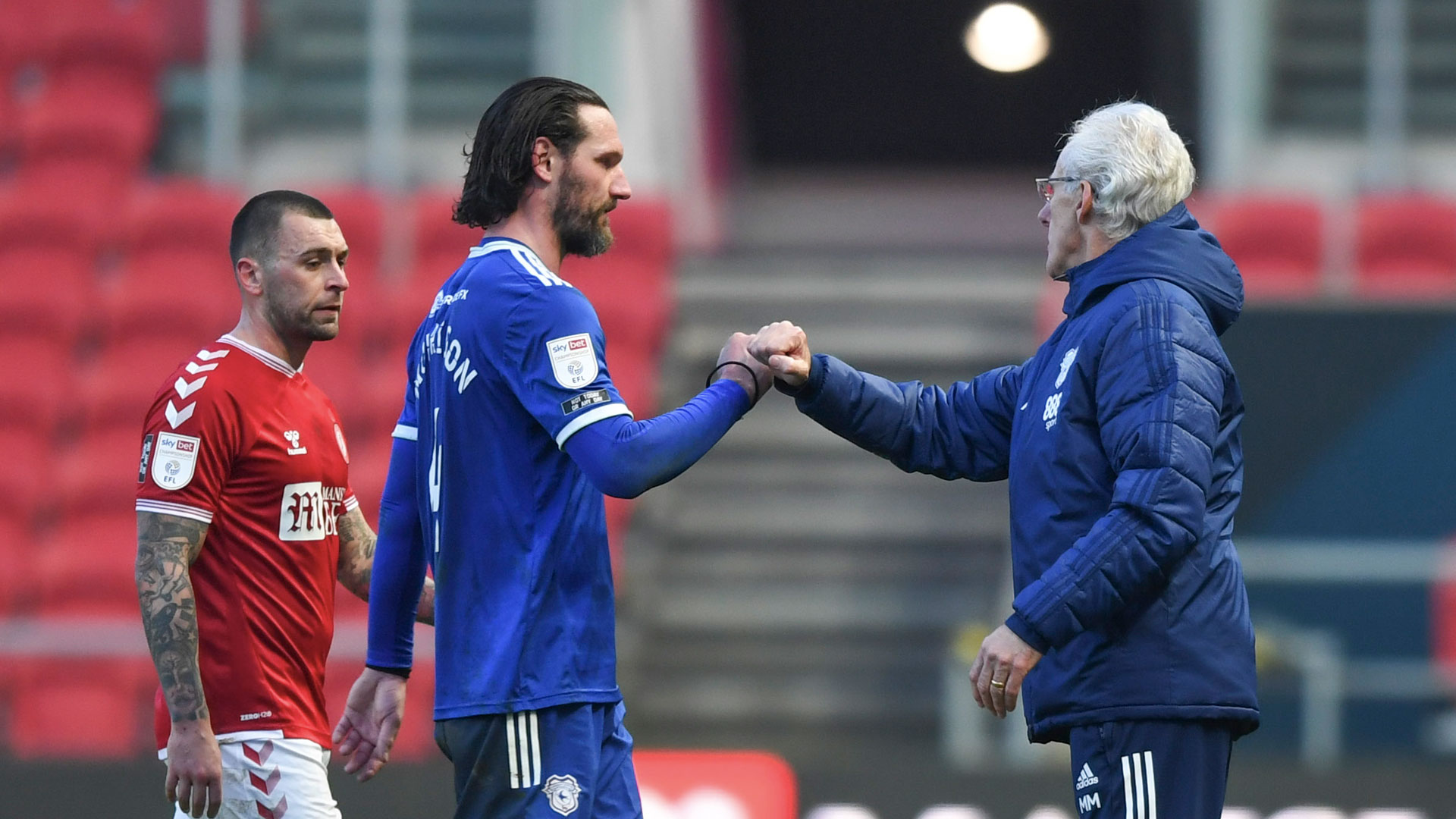 Mick McCarthy celebrates with captain Sean Morrison at Ashton Gate...