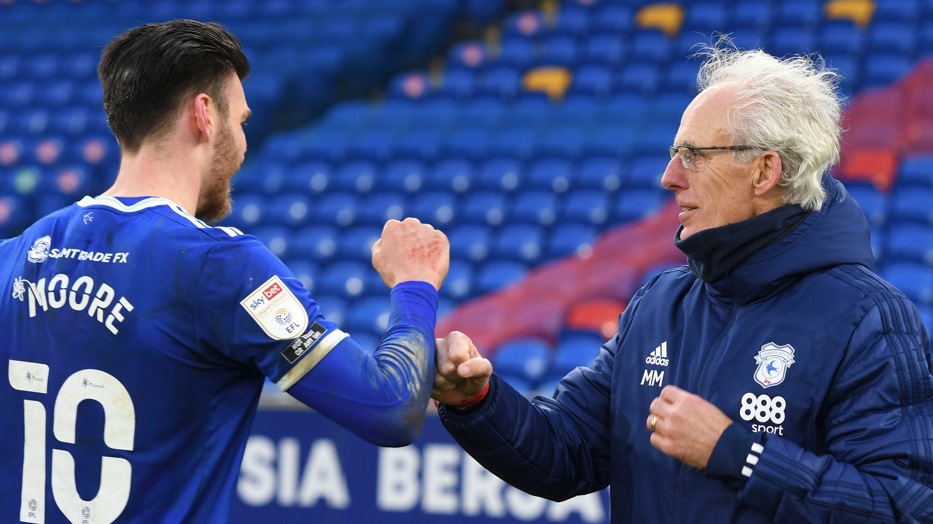 Mick McCarthy celebrates with Kieffer Moore at CCS...