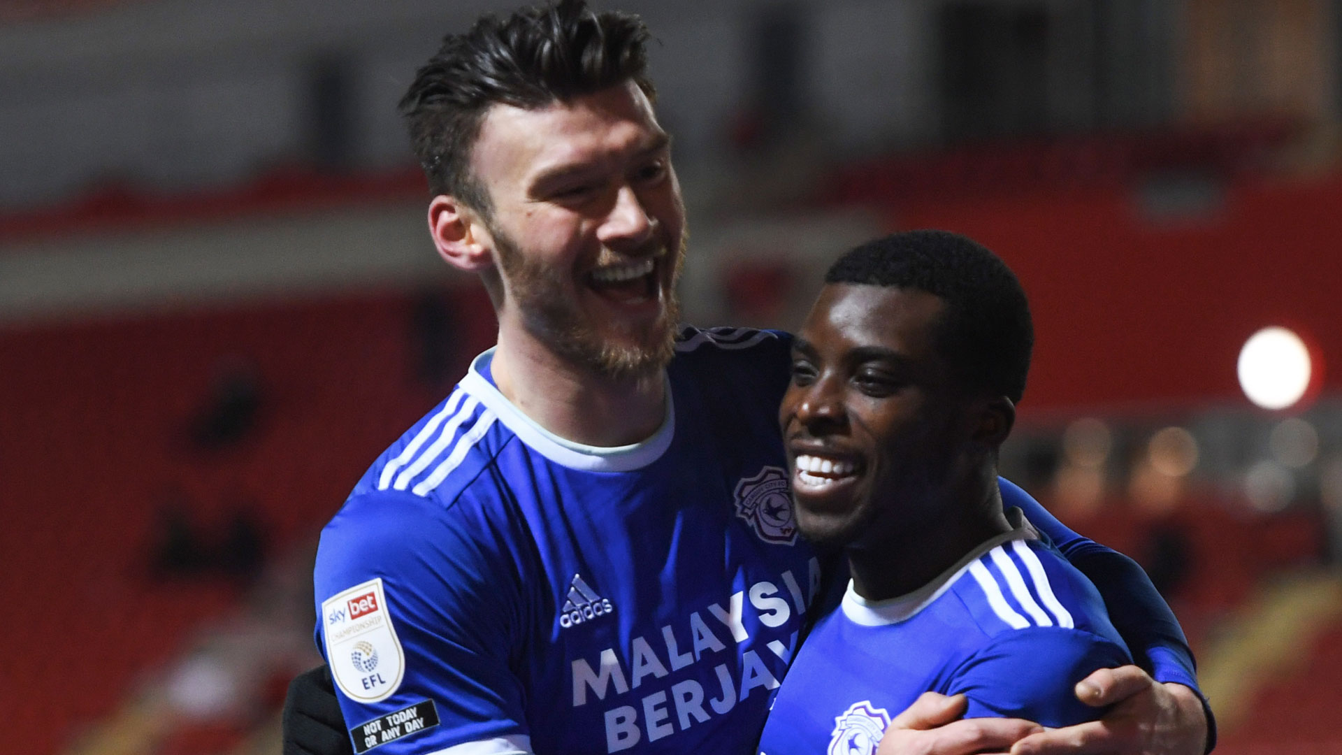 Kieffer Moore & Sheyi Ojo celebrate at Rotherham...