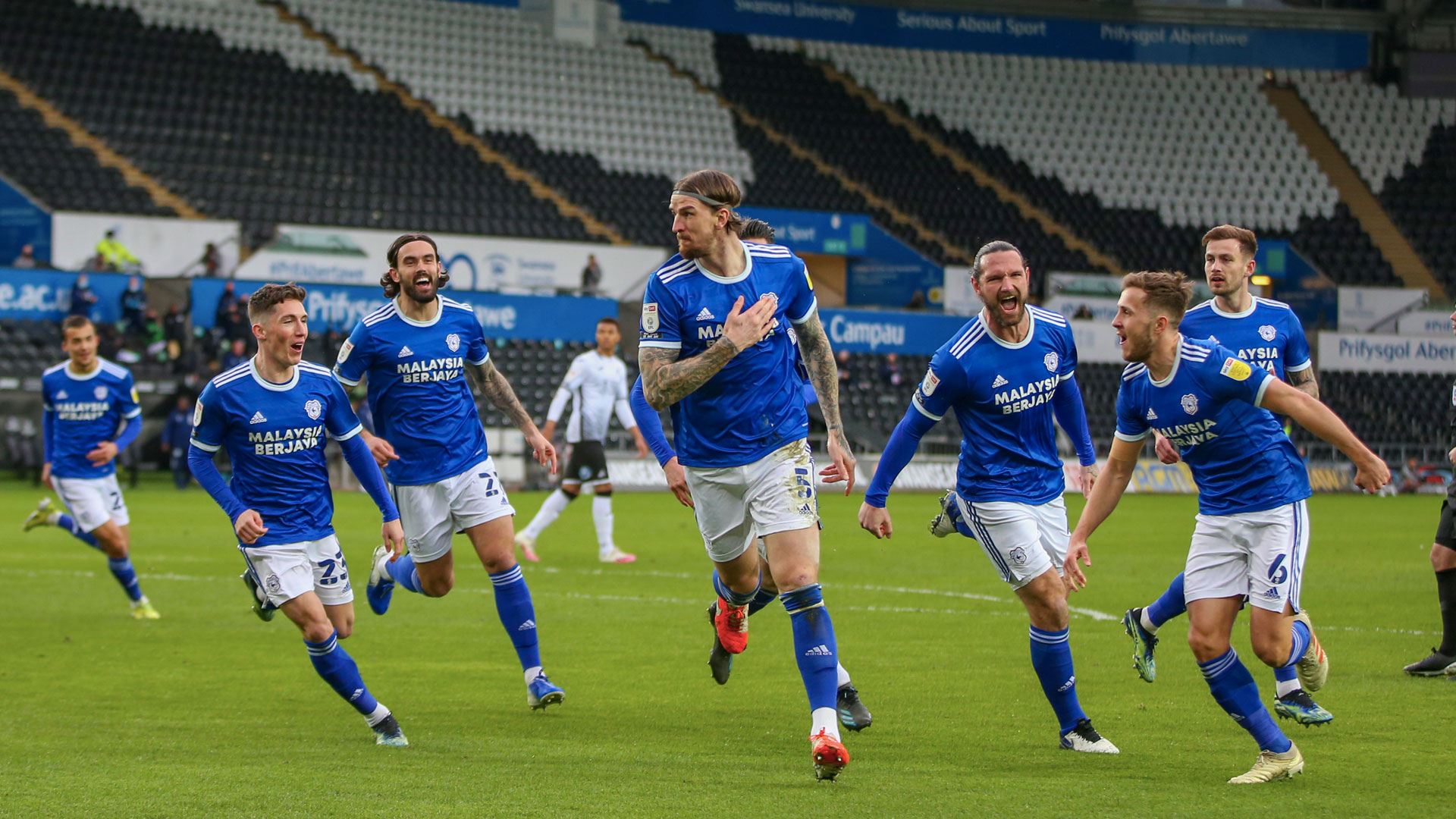 Aden Flint celebrates at the Liberty Stadium...