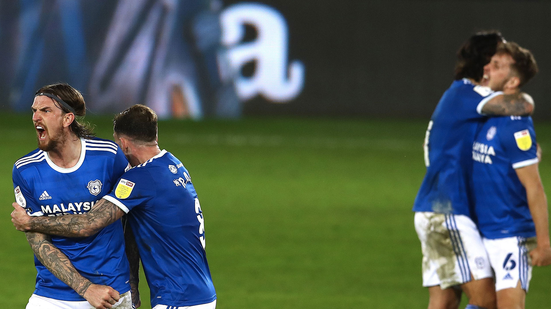 Aden Flint celebrates with Joe Ralls at the Liberty Stadium...