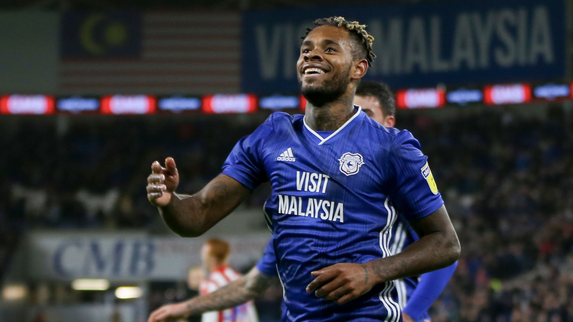 Leandro Bacuna celebrates after scoring against Stoke City...