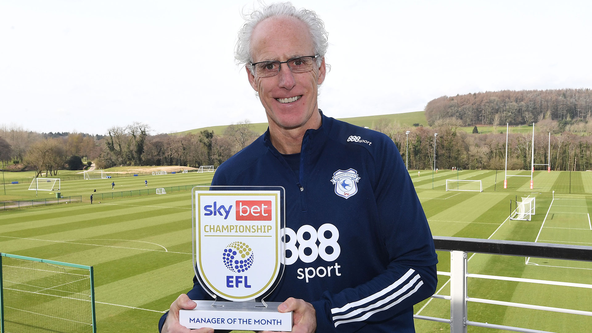 Mick McCarthy wins the Manager of the Month trophy for February...