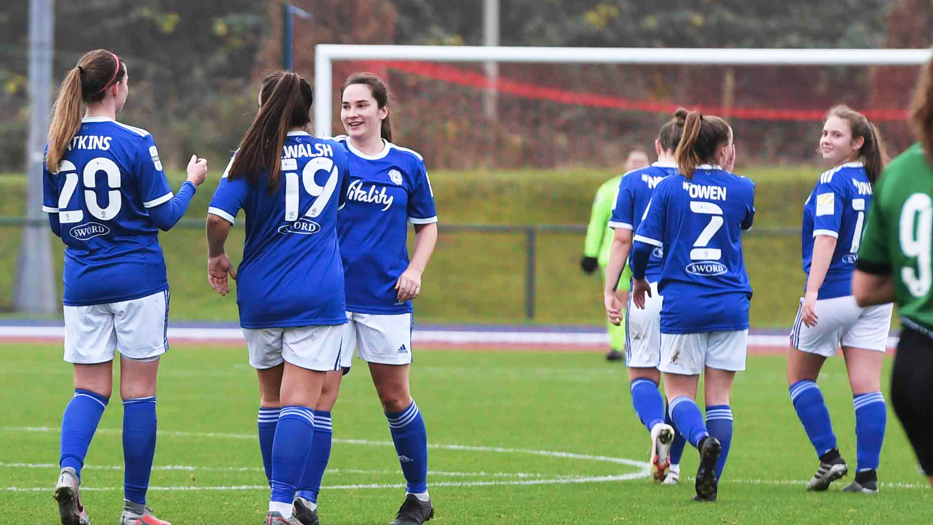 Ellie Jones looks on as Siobhan Walsh celebrates her goal against Aber...