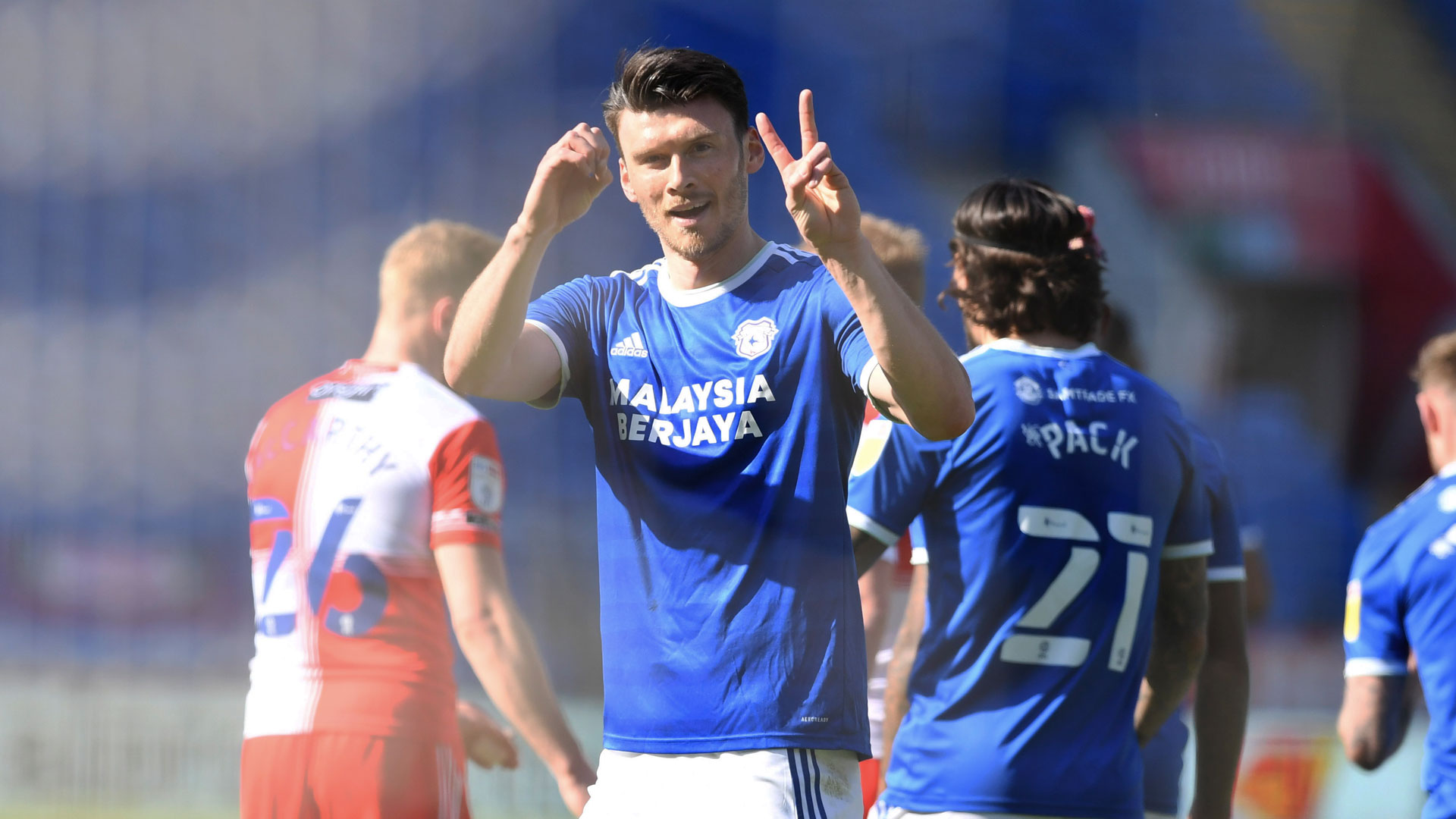 Kieffer Moore celebrates hitting 20 league goals...