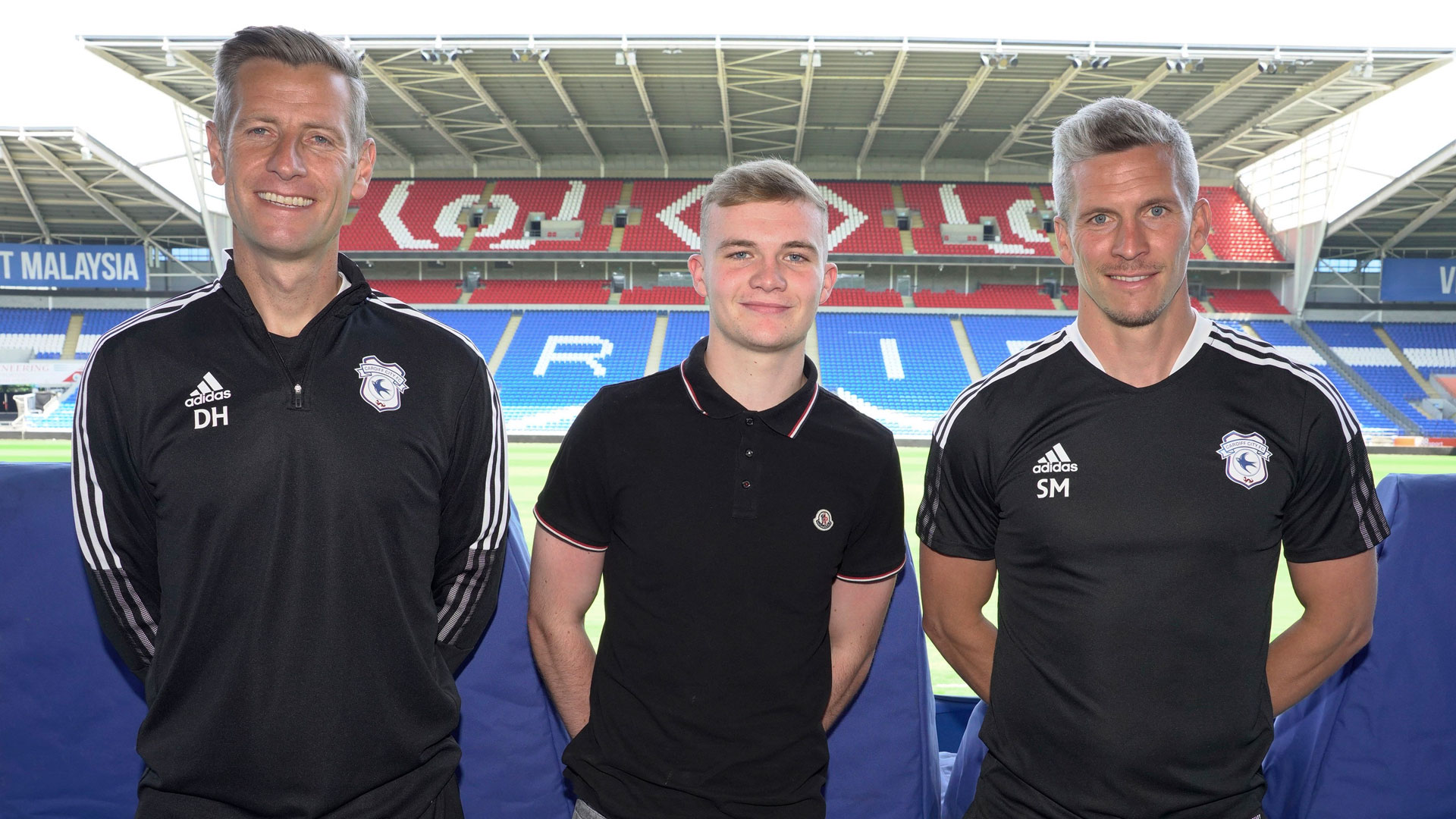 Taylor Jones with Steve Morison & David Hughes...