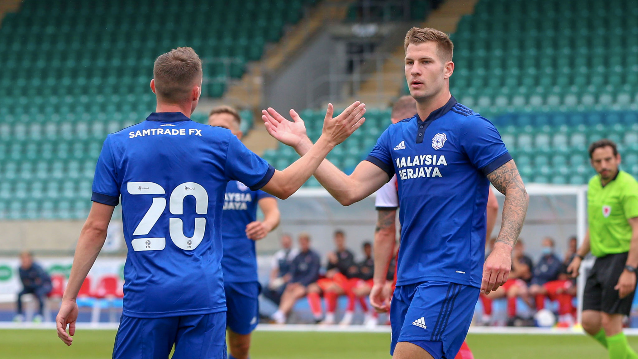 James Collins and Gavin Whyte celebrate against Exeter...