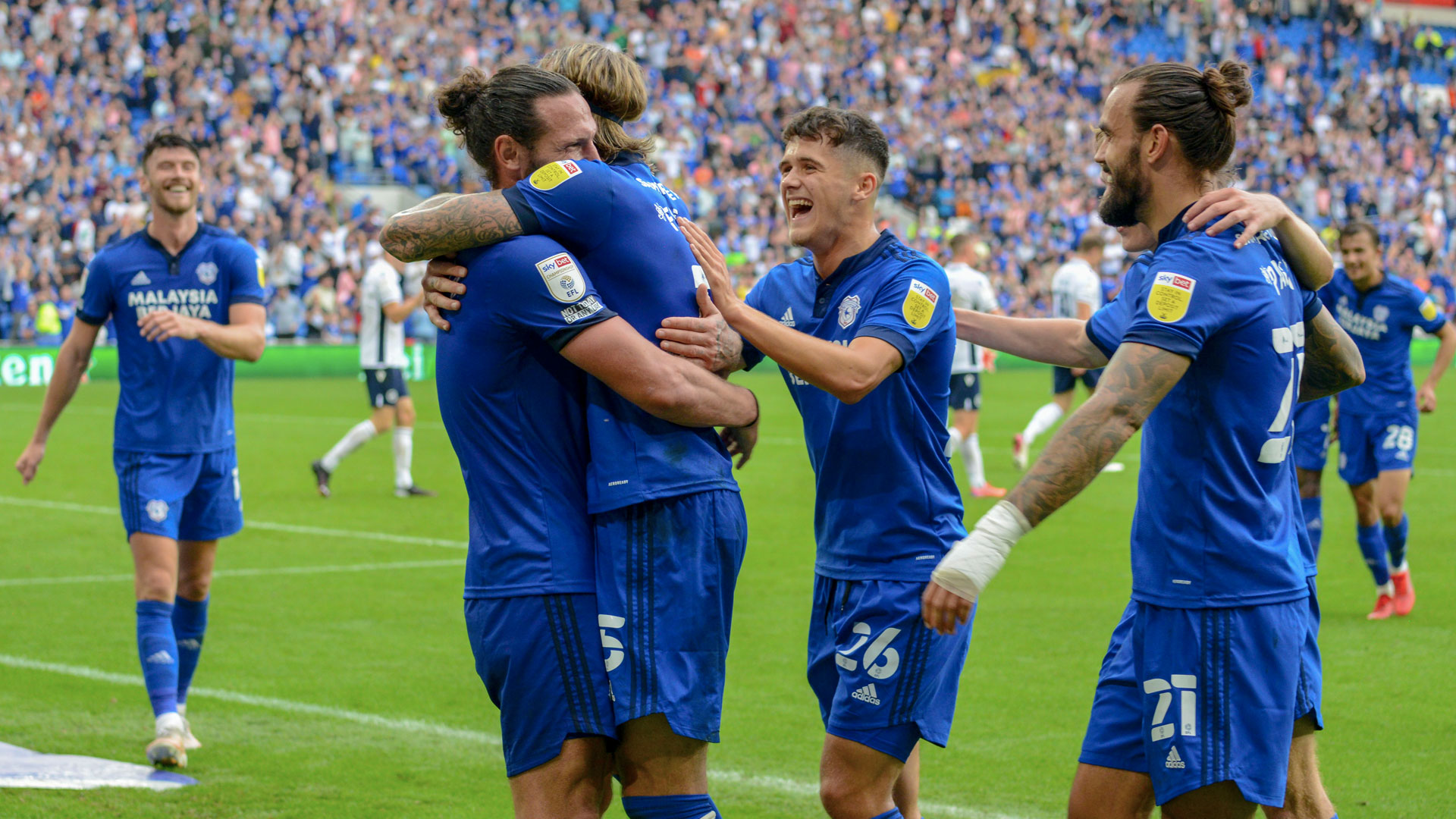 Sean Morrison and Aden Flint celebrate at CCS...