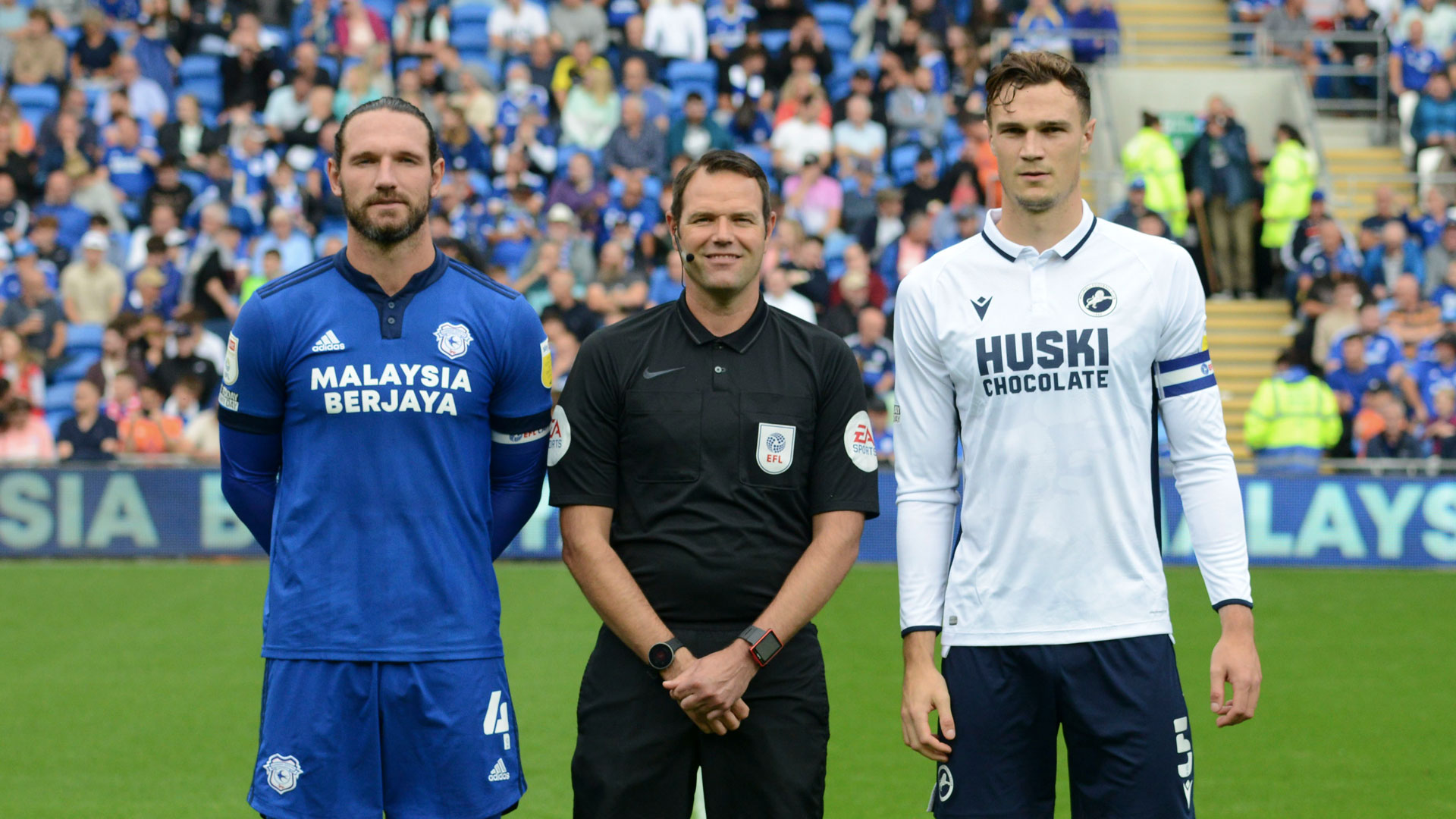 Sean Morrison, City skipper, lines up alongside his Millwall counterpart, pre-match...