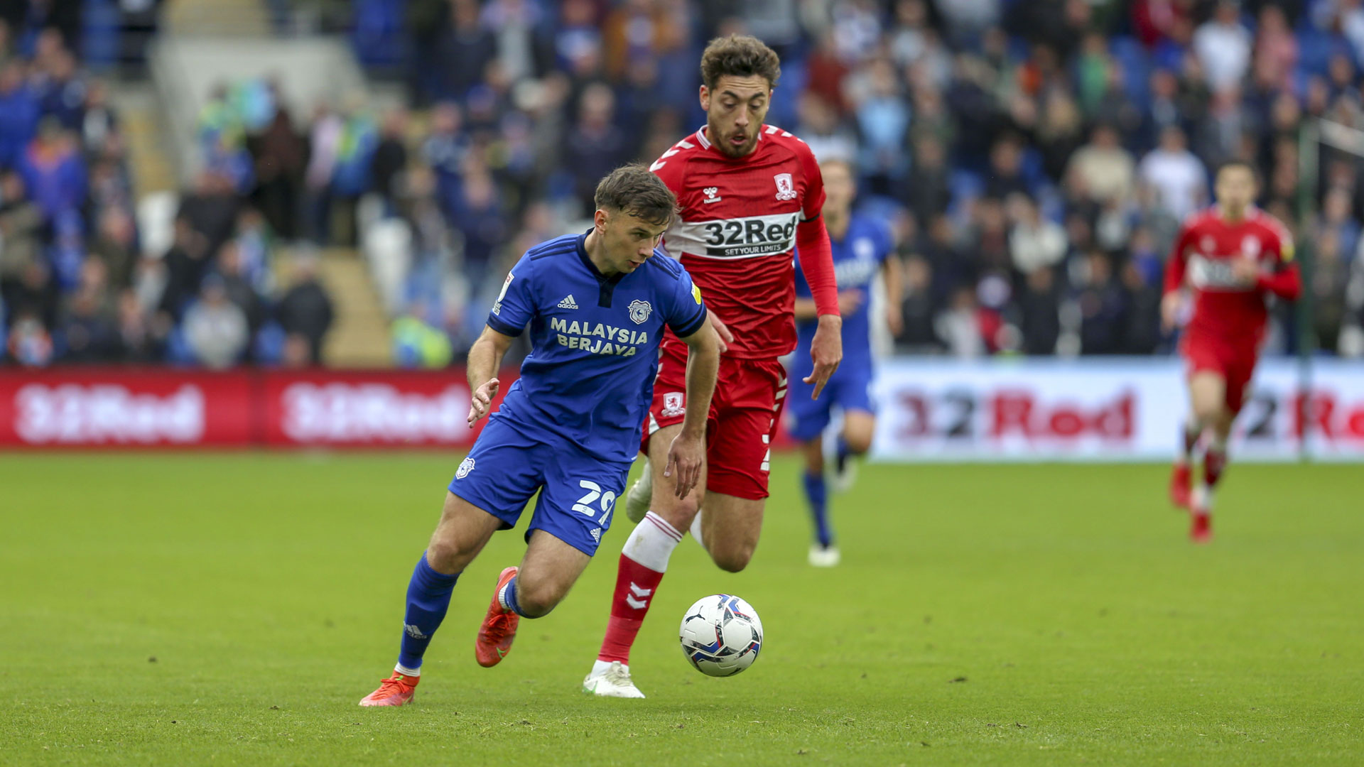 Mark Harris drives forward against Middlesbrough...