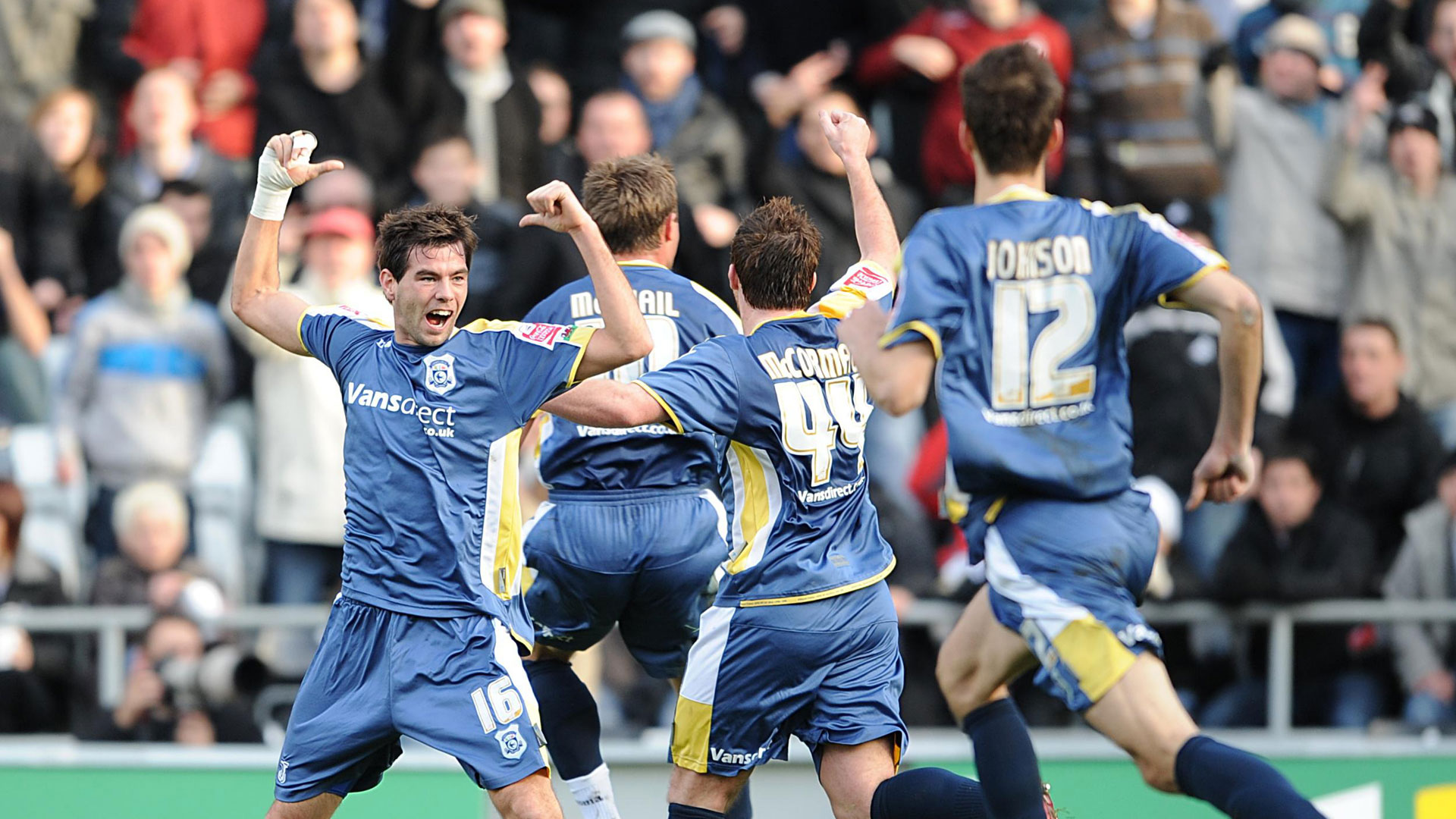 Joe Ledley celebrates his goal...