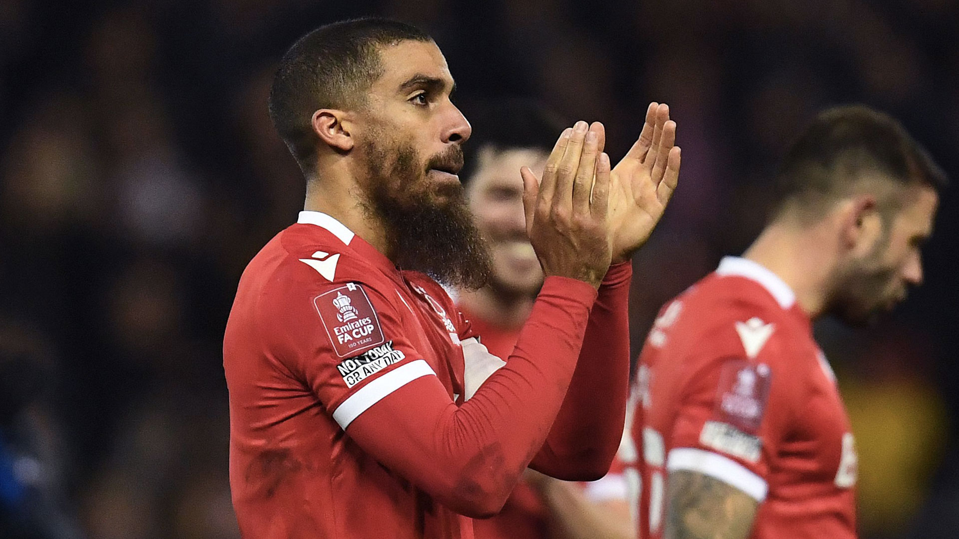 Lewis Grabban applauds the Forest fans...