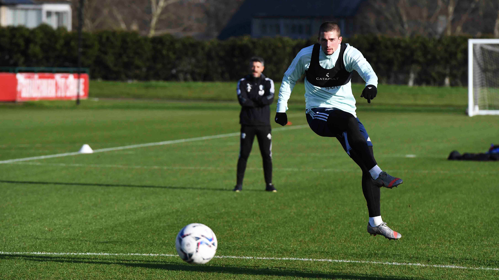 Max Watters strikes towards goal in training...