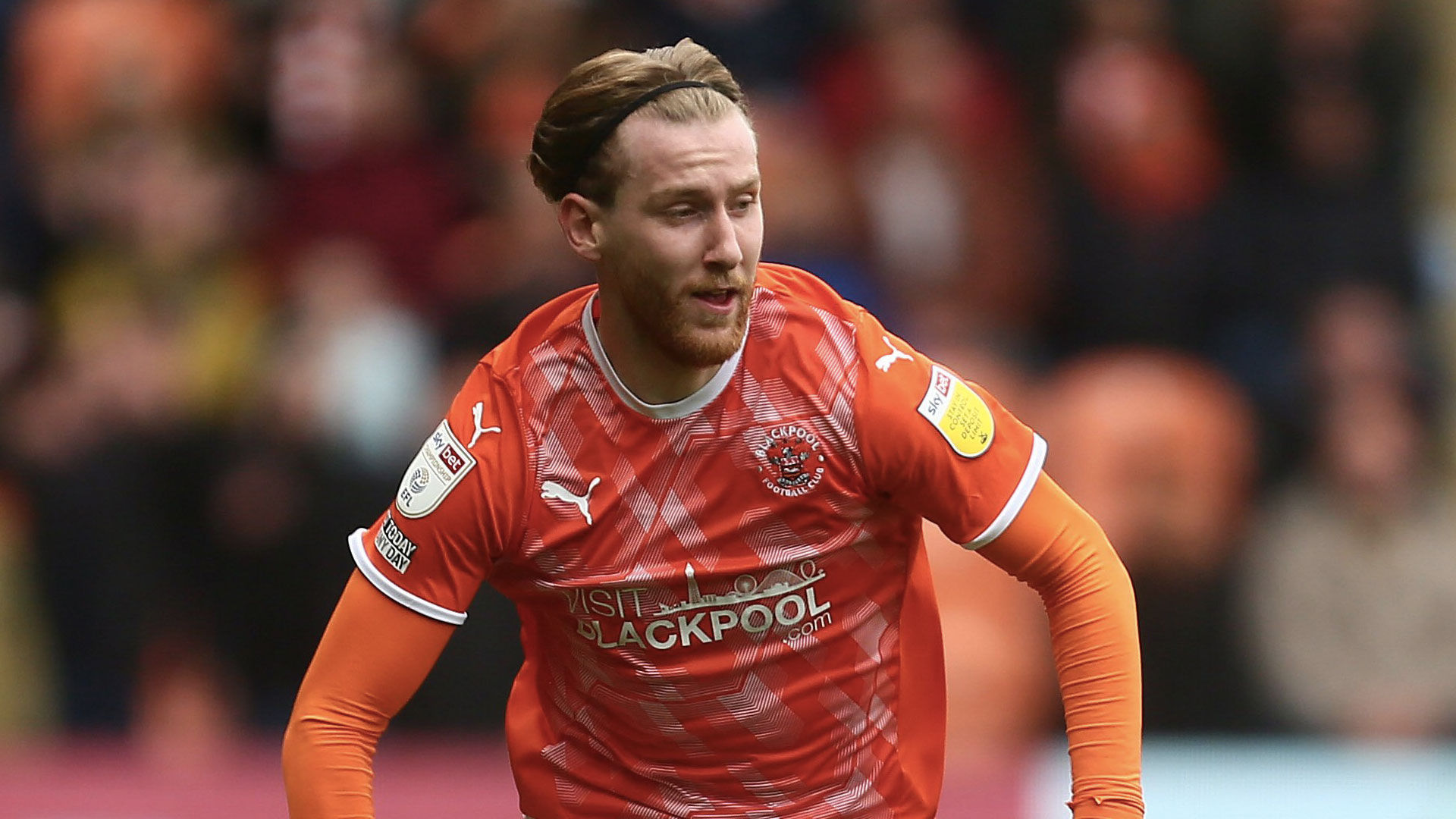 Josh Bowler in action for Blackpool...