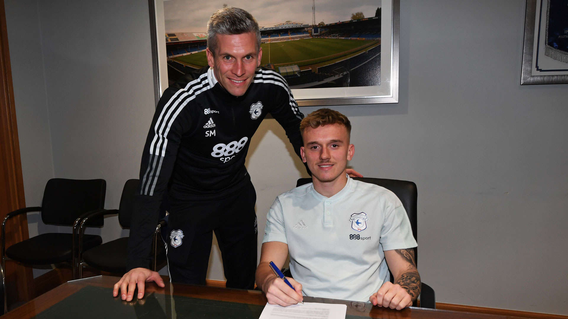 Isaak Davies and Steve Morison in the boardroom at Cardiff City Stadium...