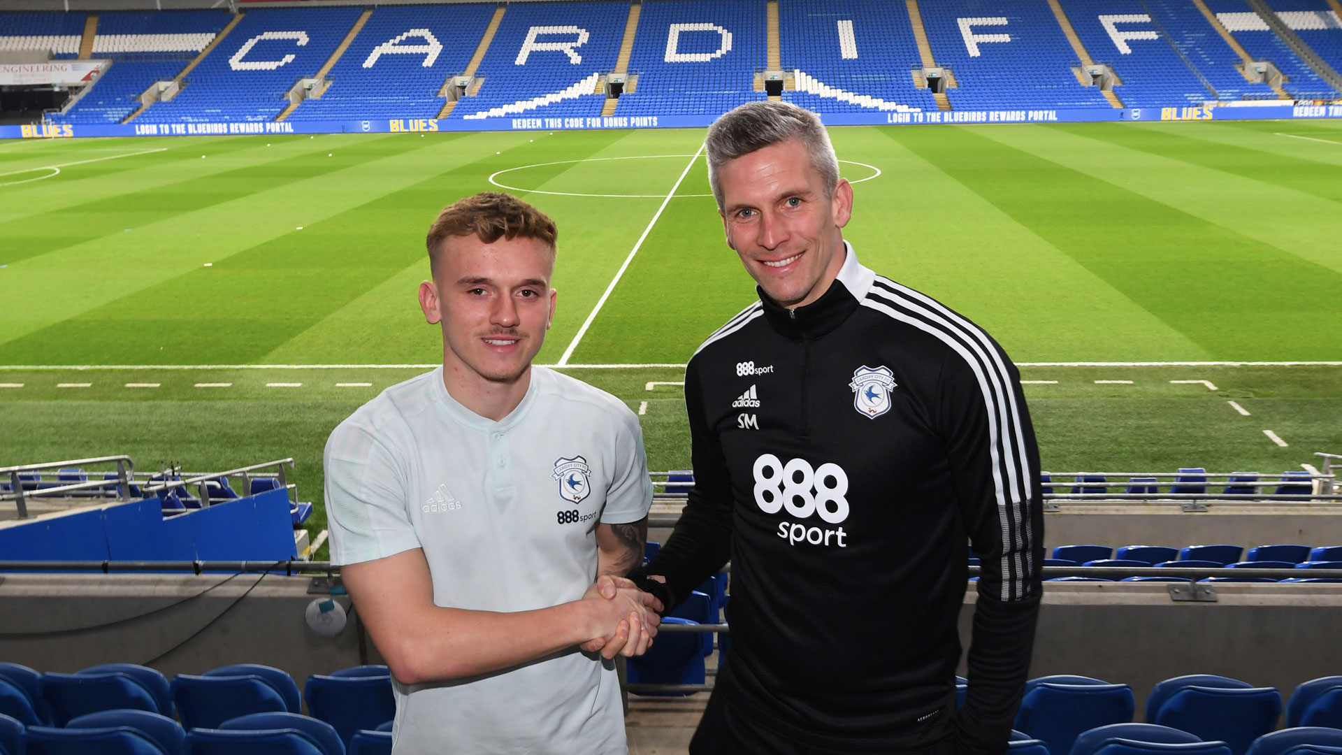 City forward Isaak Davies and manager Steve Morison...