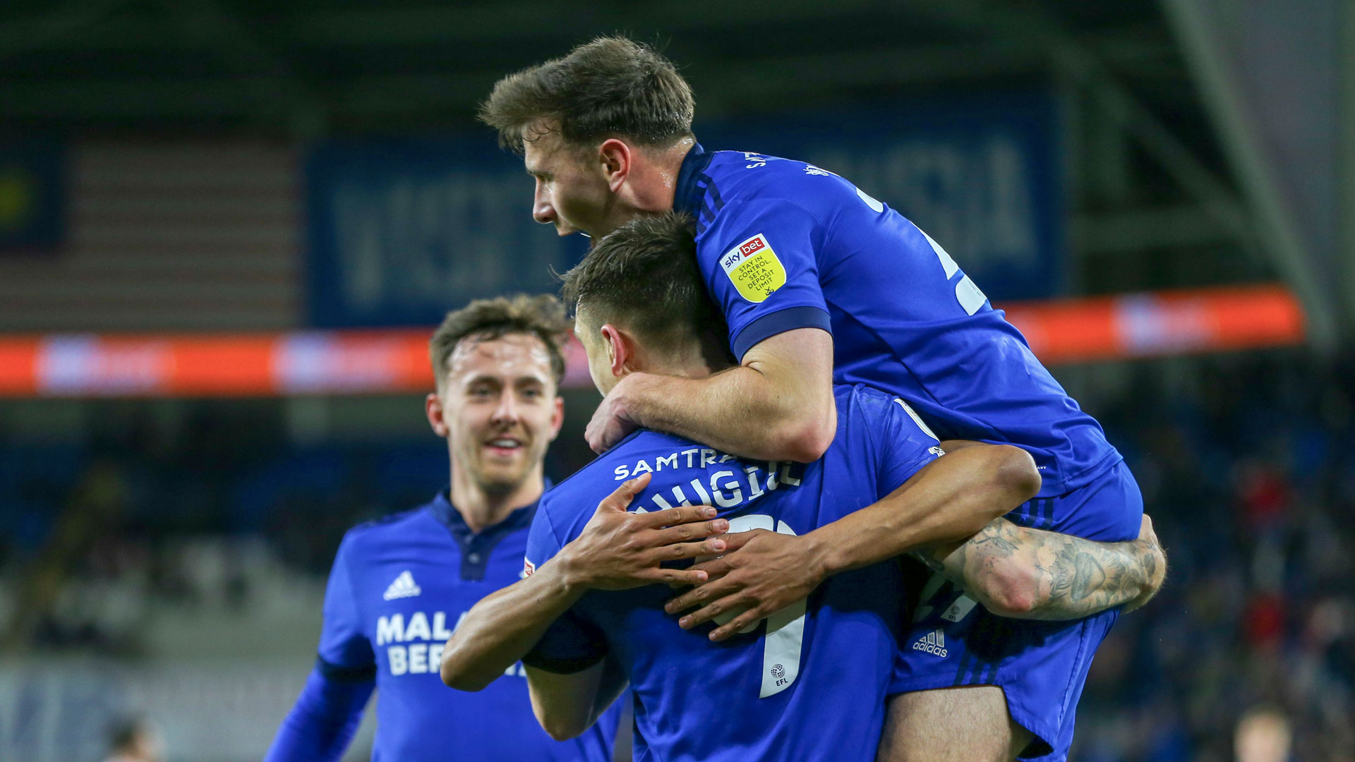 Jordan Hugill and Mark Harris celebrate the winner against Stoke City...