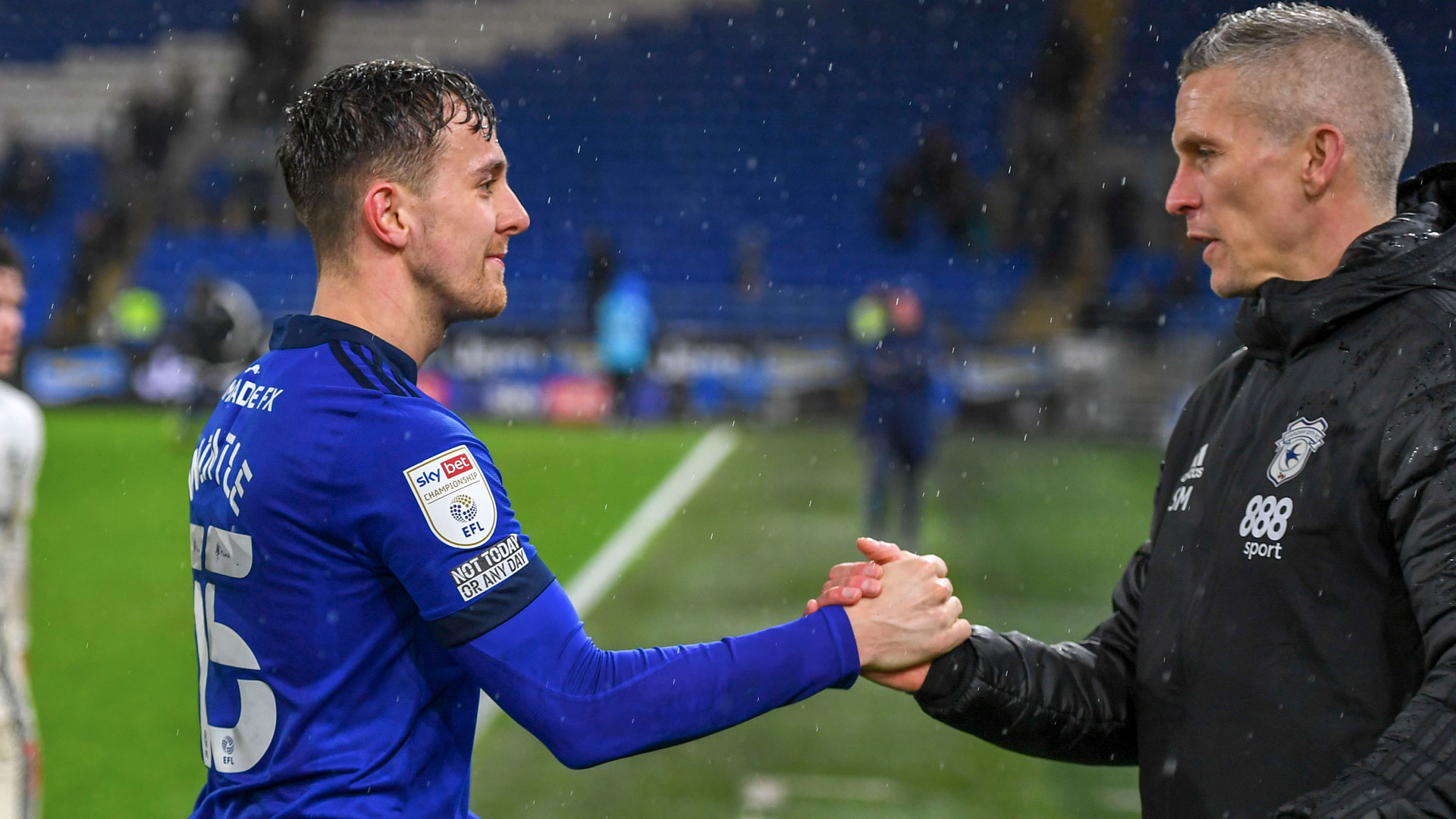 City midfielder Ryan Wintle with boss Steve Morison...