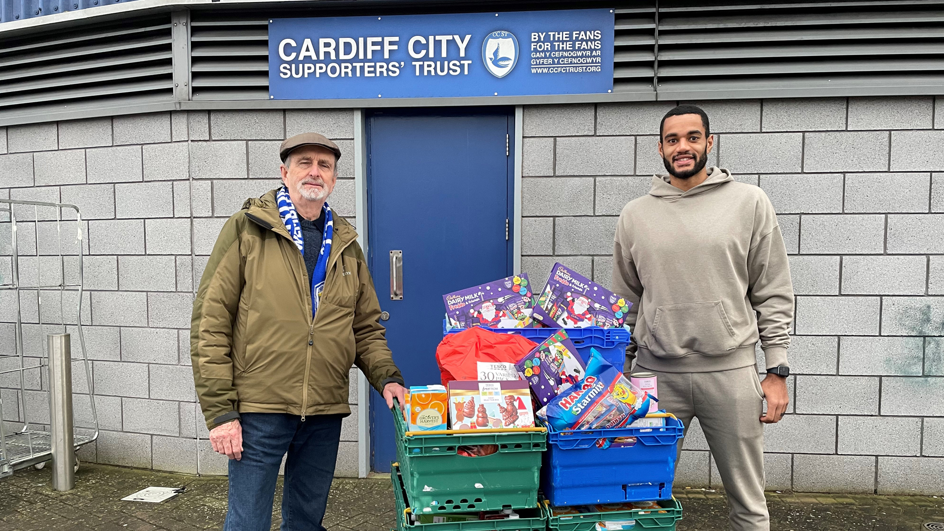 Curtis Nelson helping with a donation to a Foodbank