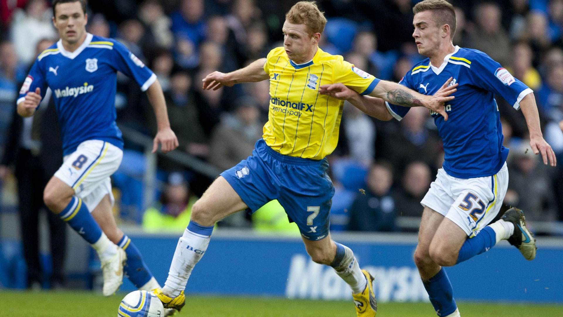 Chris Burke in action for Birmingham City against Cardiff City...