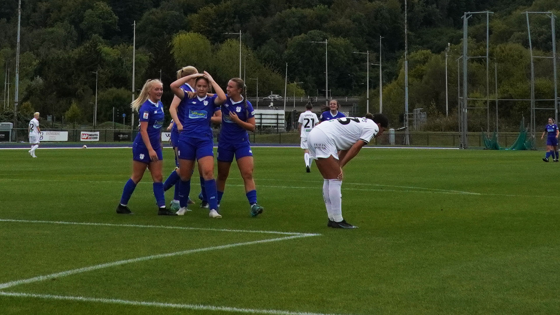 Phoebie Poole celebrates her brace against Swansea City...