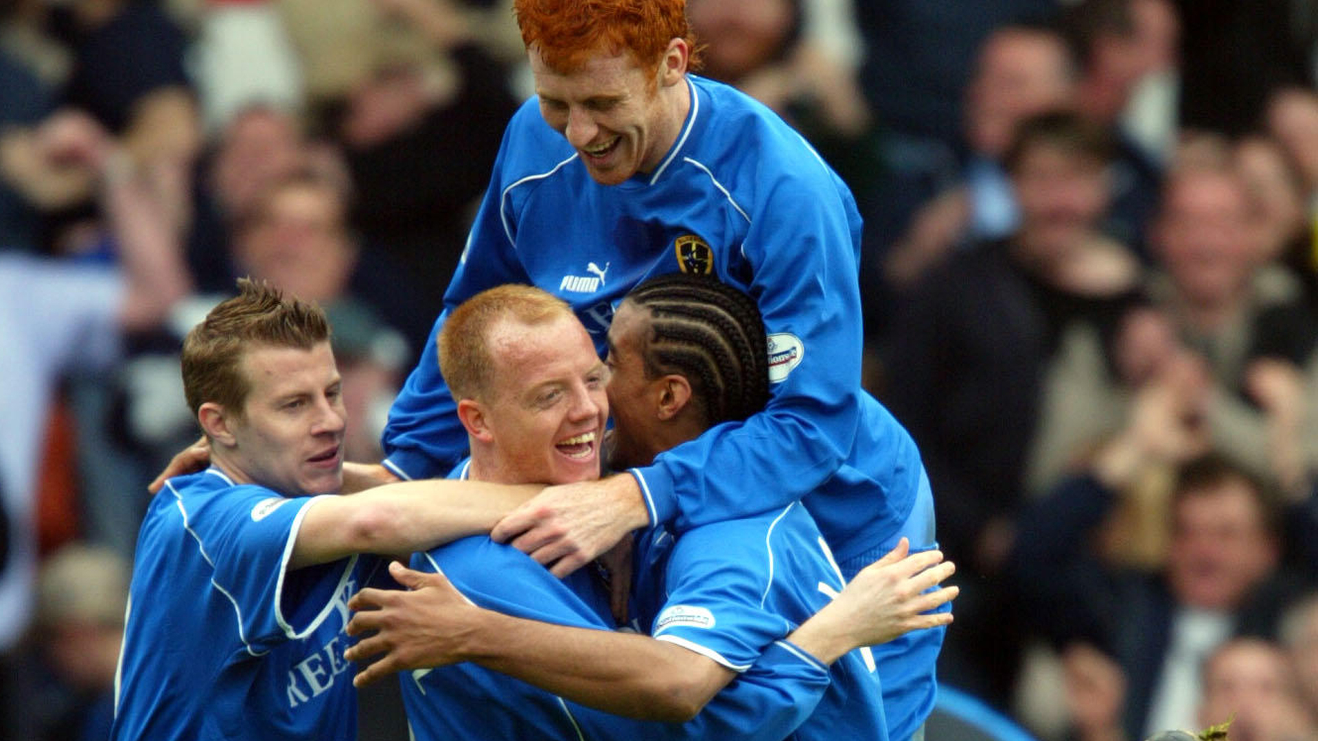 Andy Campbell celebrates scoring against Burnley at Ninian Park.