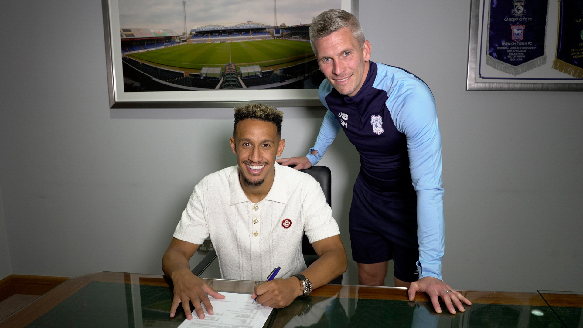 Callum Robinson with City boss Steve Morison...