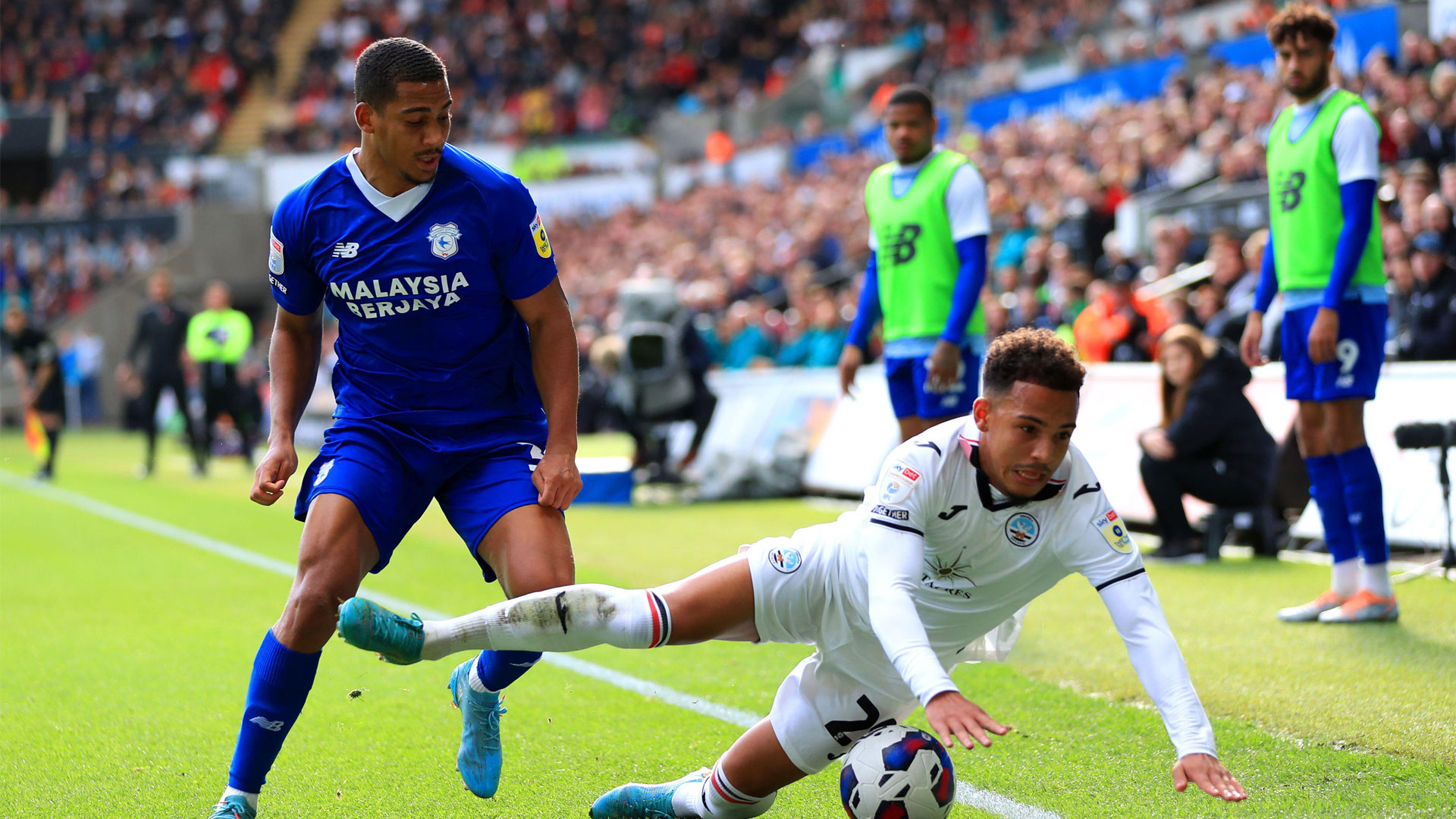 Andy Rinomhota in action against Swansea City...