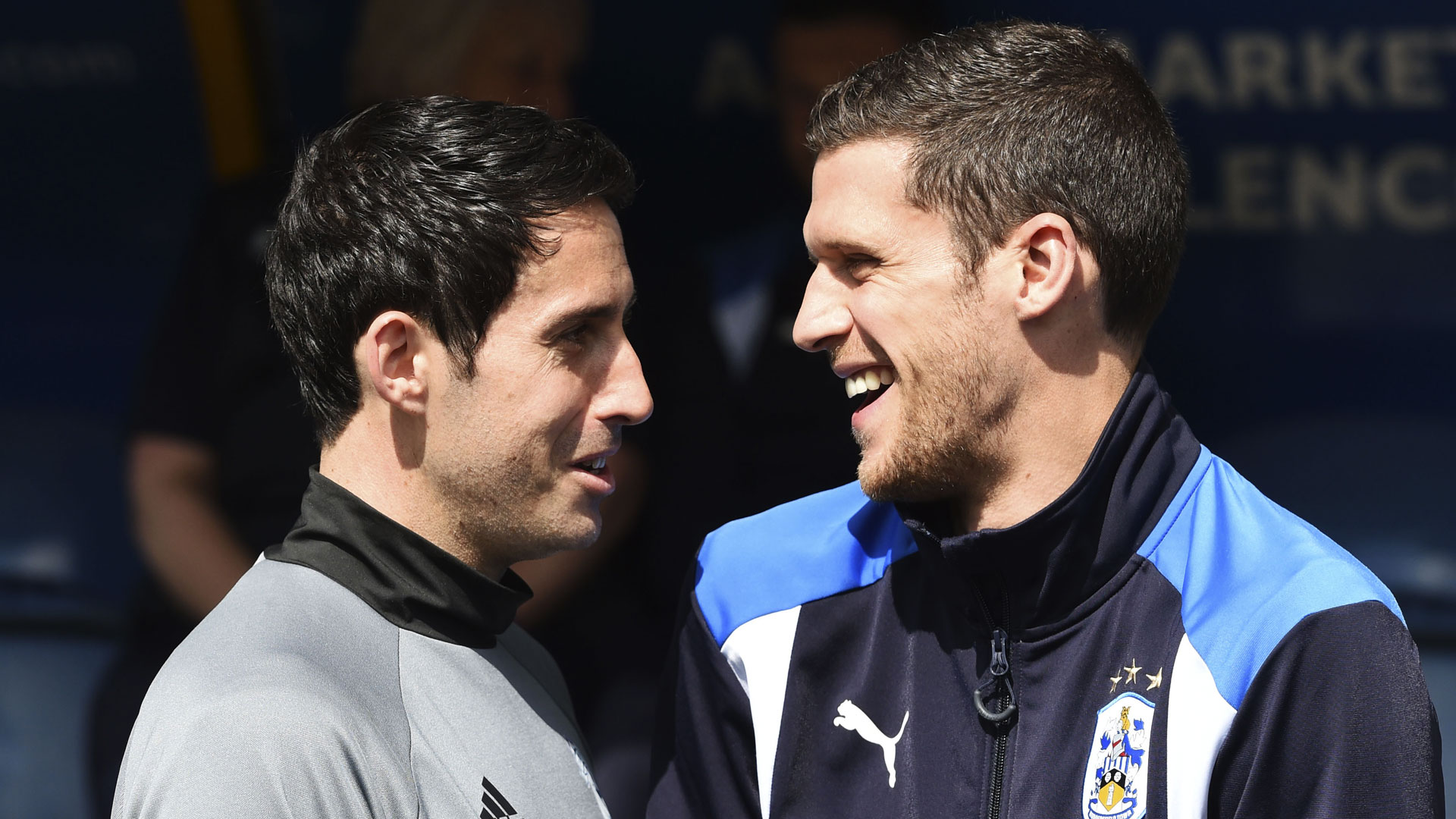 Mark Hudson and Peter Whittingham talk before the 2017 match between City and Huddersfield Town...