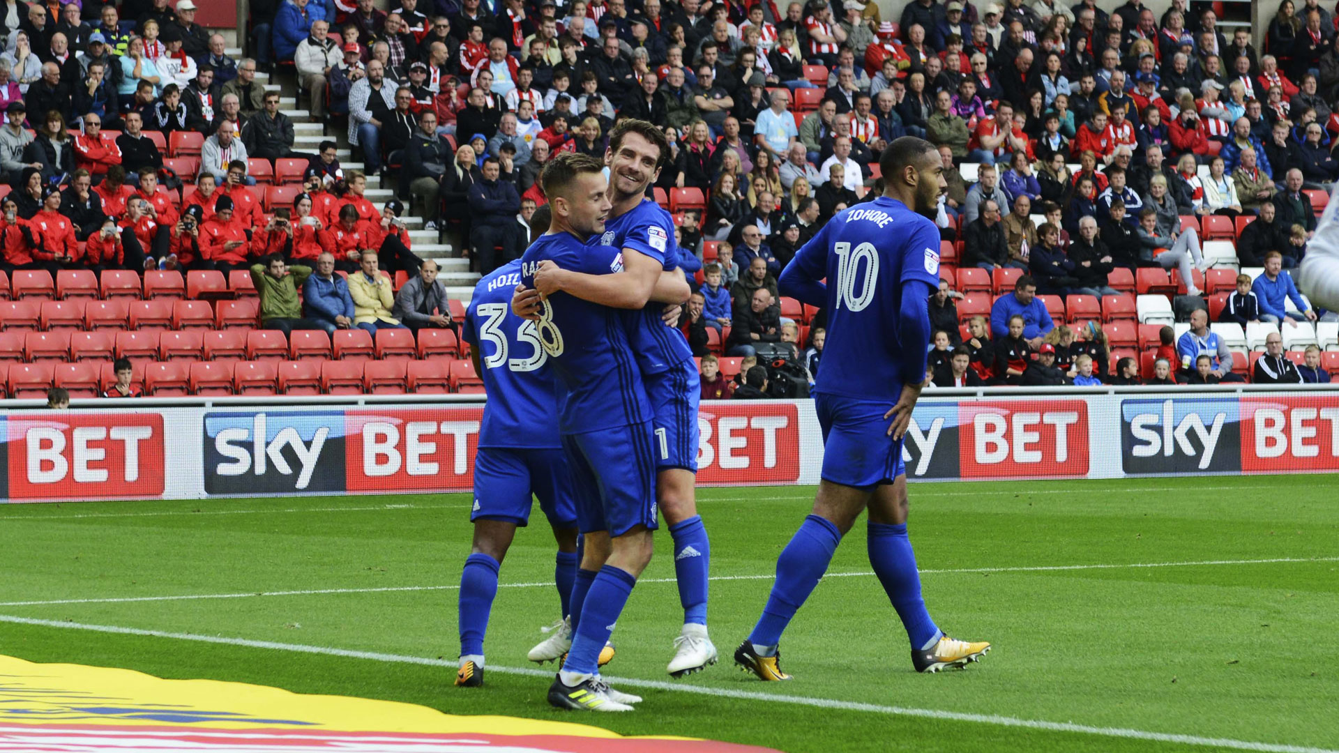 Joe Ralls and Craig Bryson celebrate their goals at Sunderland...