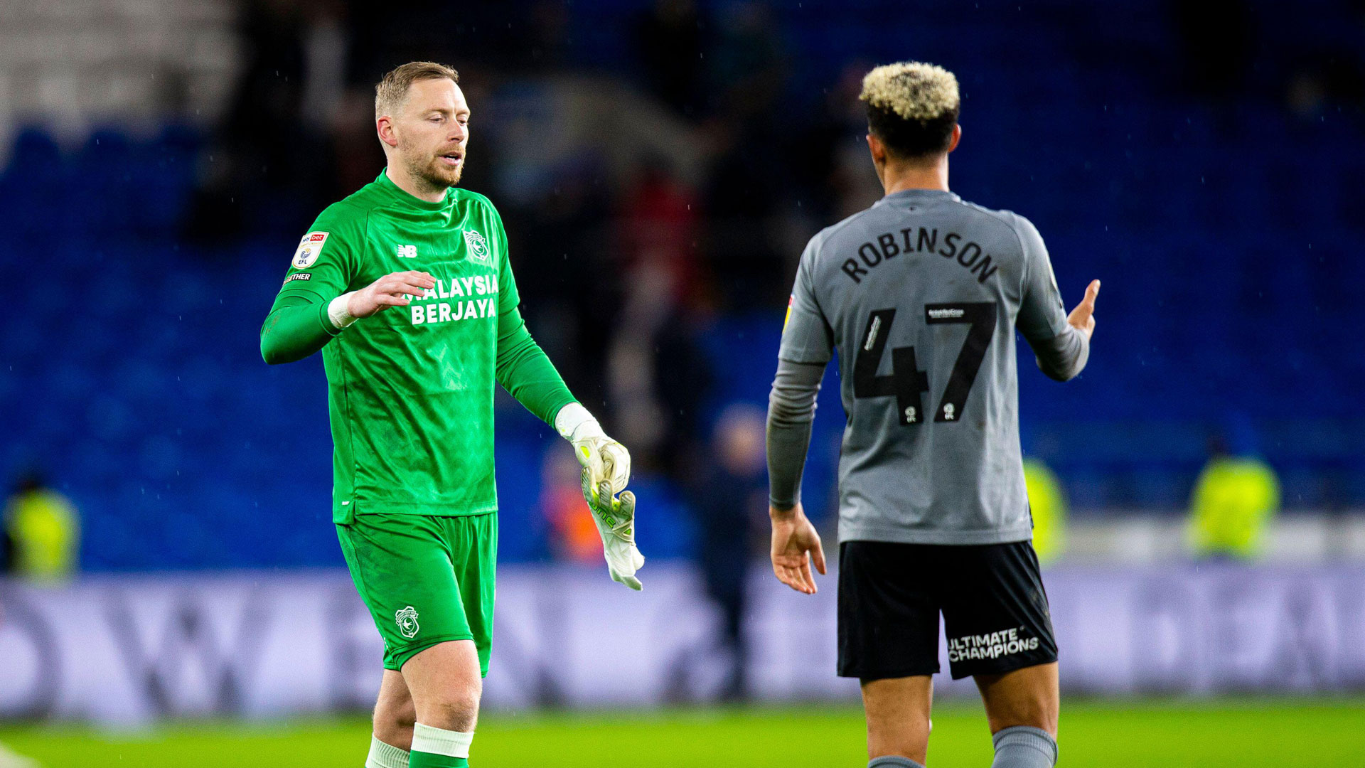 Ryan Allsop and City forward Callum Robinson...