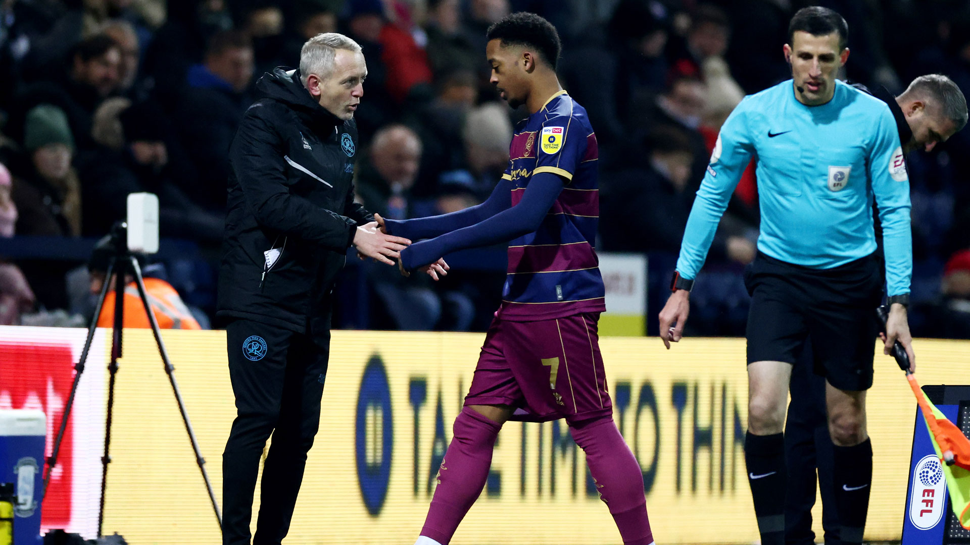 QPR boss Neil Critchley with Chris Willock...