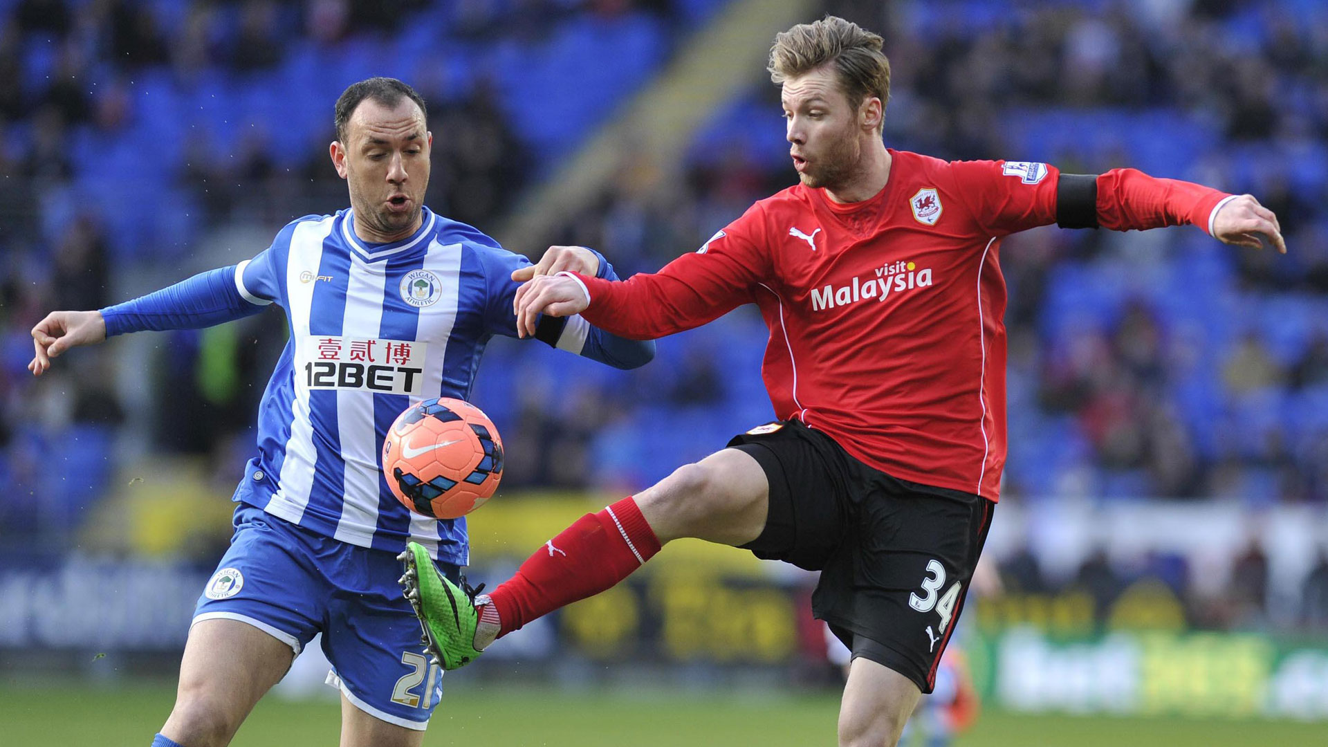 Jo Inge Berget in action for City against Wigan Athletic...