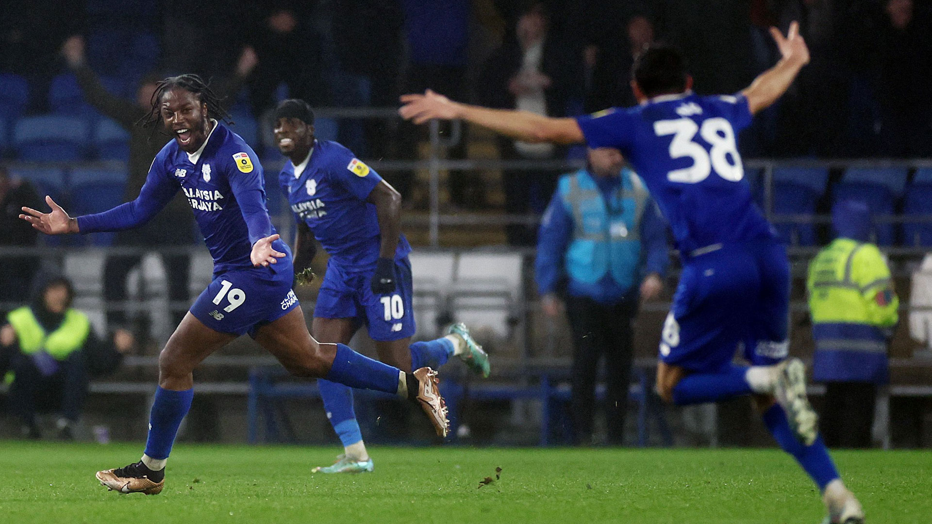 Romaine Sawyers celebrates the winner against Reading...