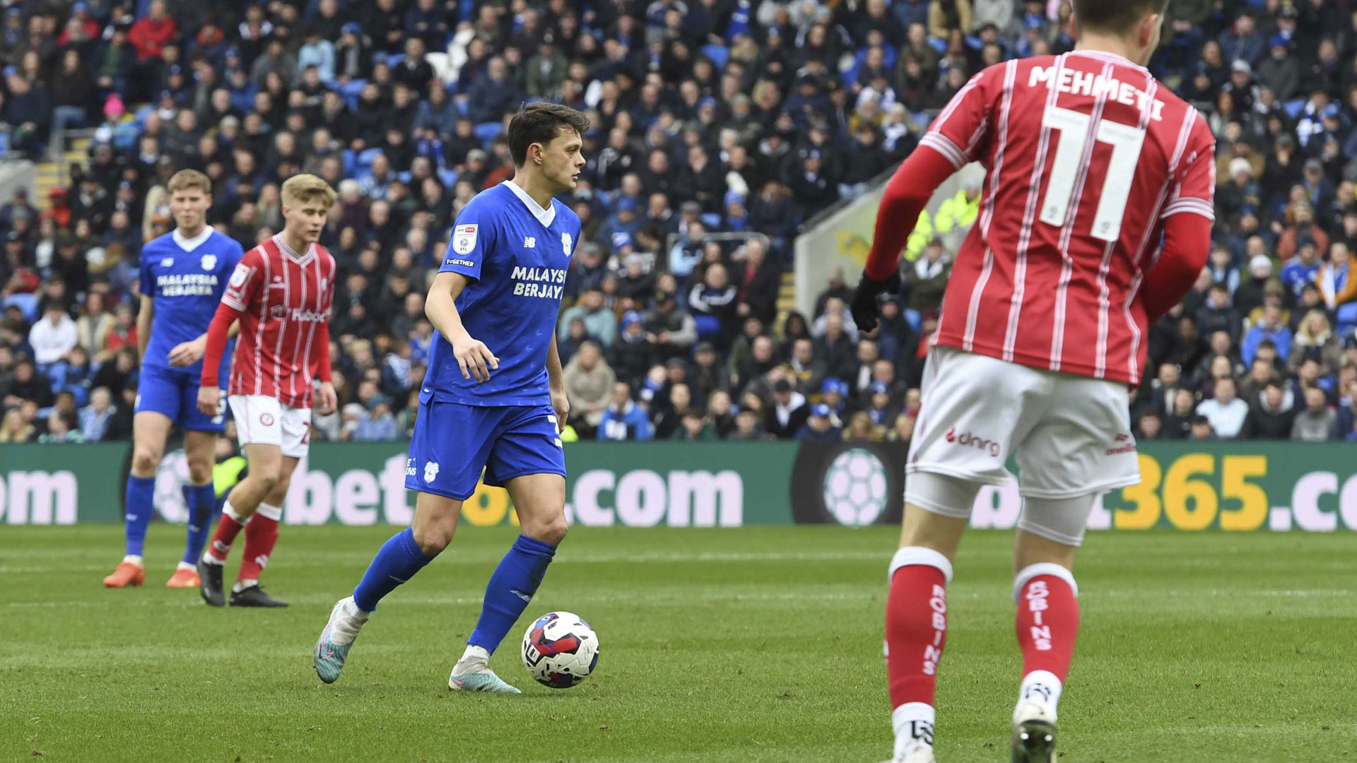 Perry Ng in defence against Bristol City...