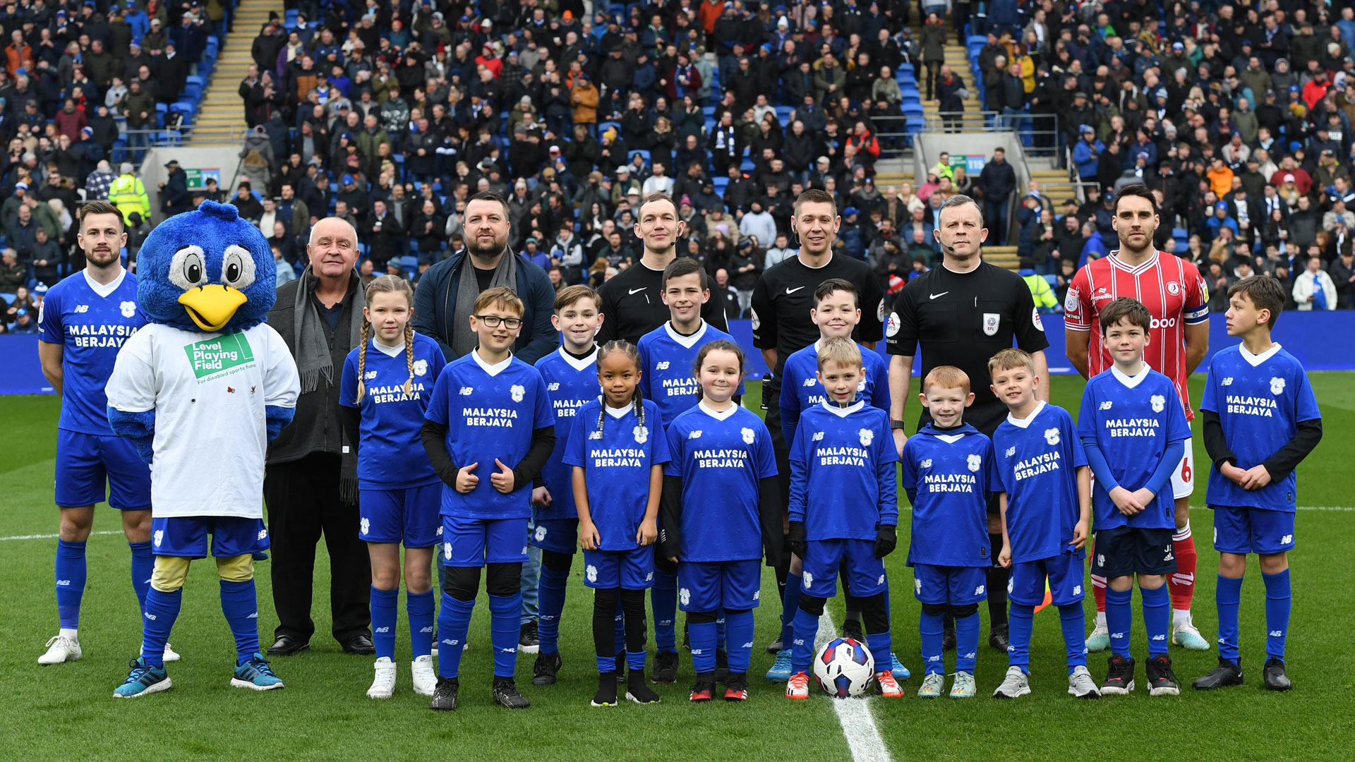 Our match sponsors join in the pre-match photo...